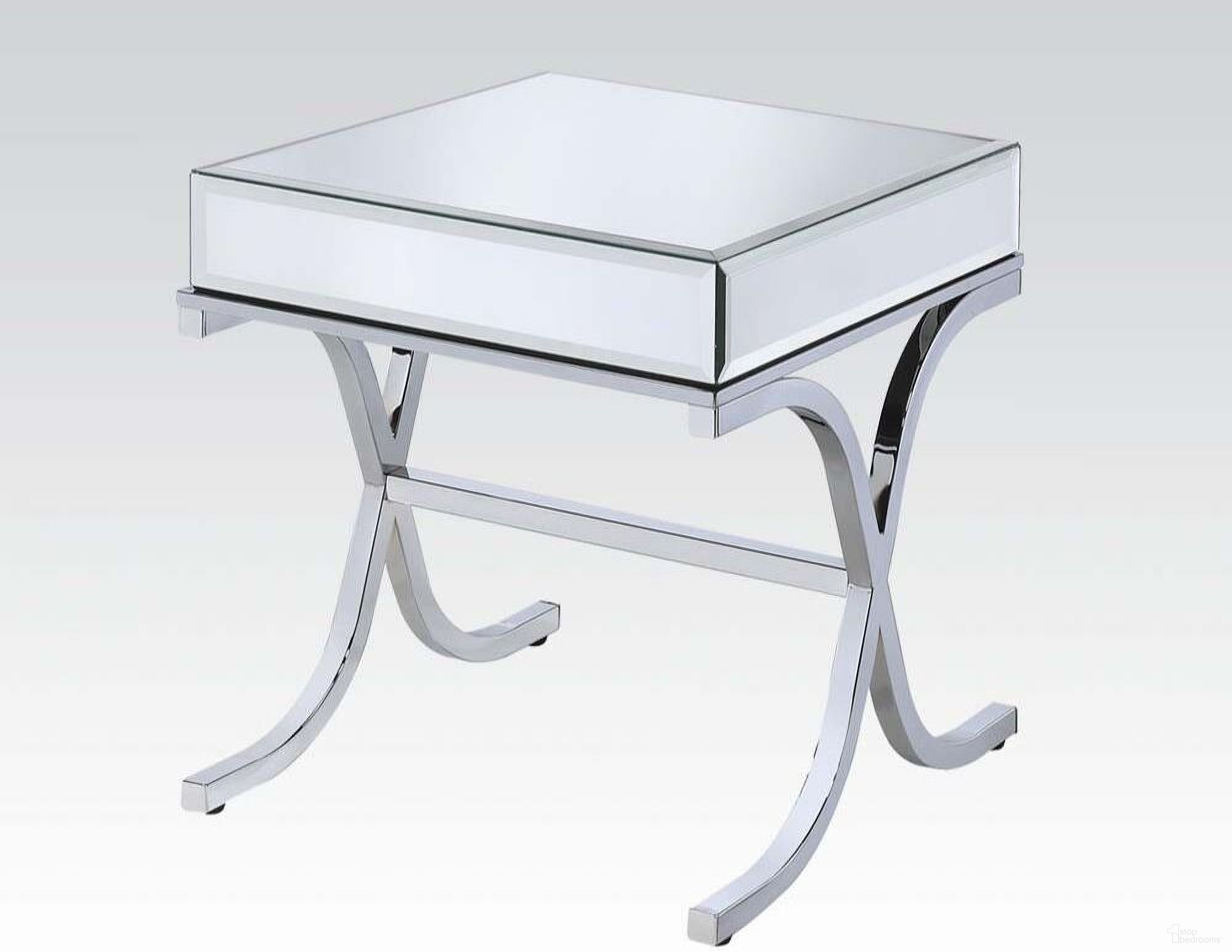 The appearance of Homeroots Mirrored Top And Chrome End Table designed by Homeroots in the traditional interior design. This chrome piece of furniture  was selected by 1StopBedrooms from  to add a touch of cosiness and style into your home. Sku: 286043. Material: Glass.