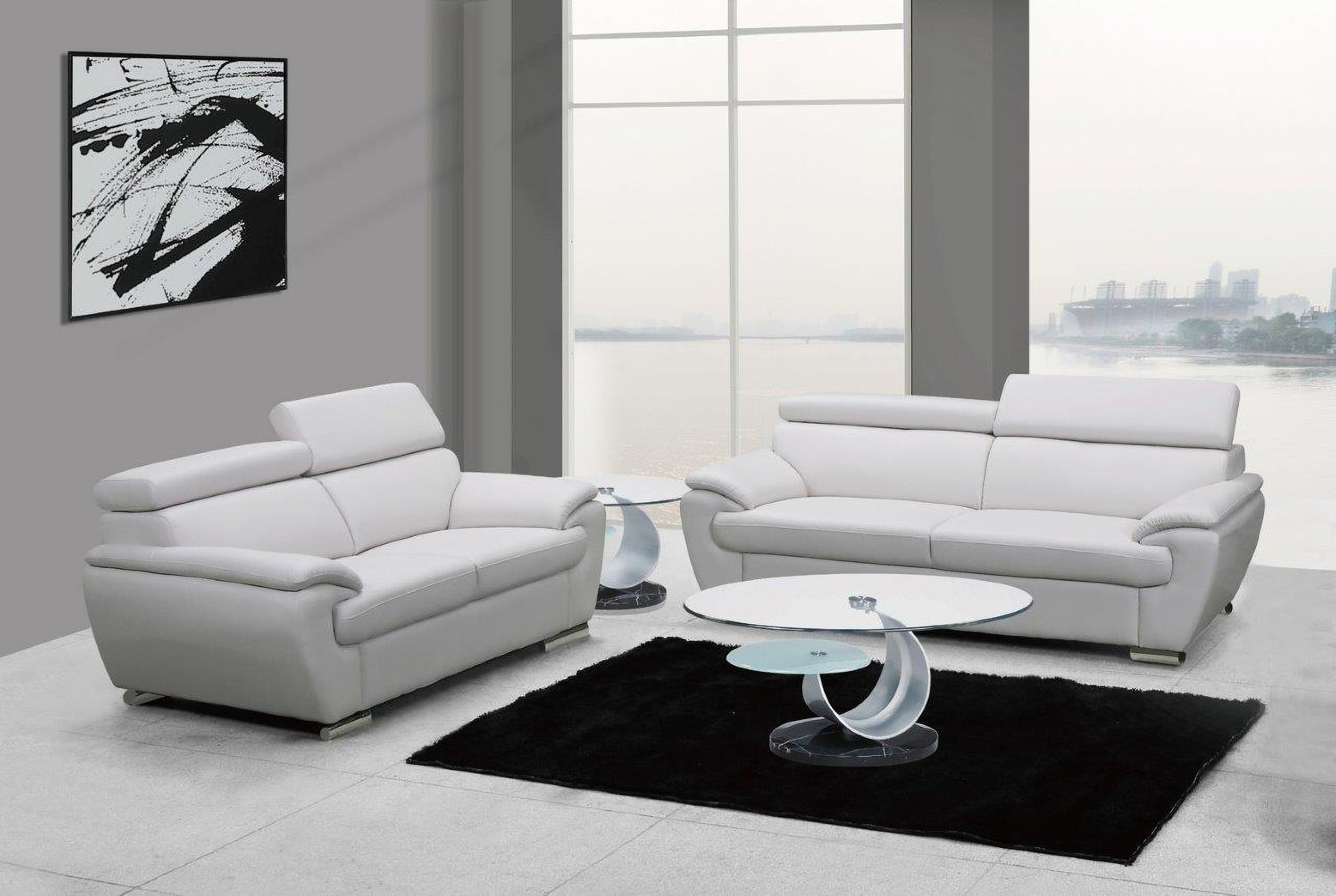 The appearance of Homeroots Modern White Leather Sofa And Loveseat 343849 designed by Homeroots in the modern / contemporary interior design. This white piece of furniture was selected by 1StopBedrooms from to add a touch of cosiness and style into your home. Sku: 343849. Material: Leather.