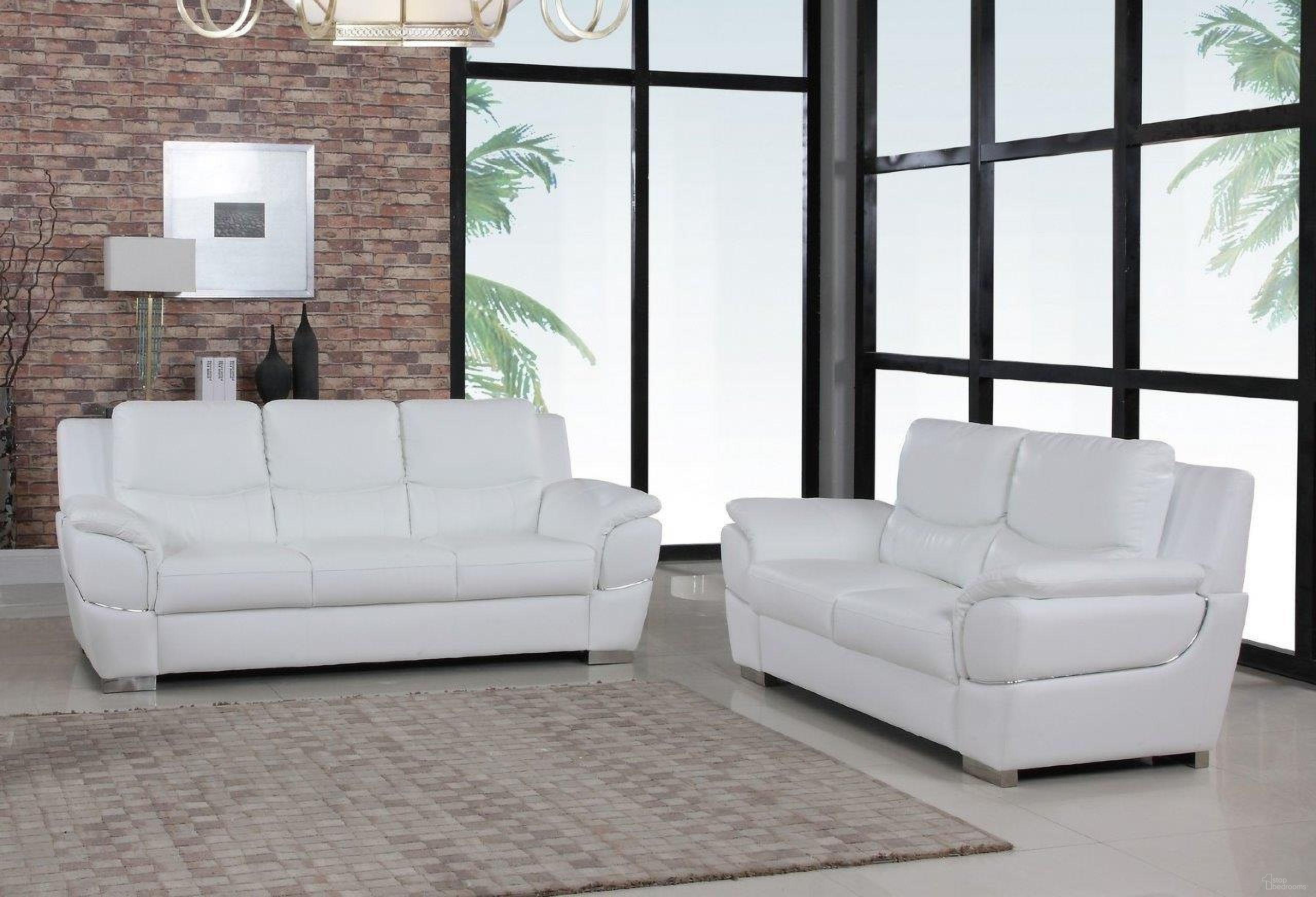 The appearance of Homeroots Modern White Leather Sofa And Loveseat designed by Homeroots in the modern / contemporary interior design. This white piece of furniture was selected by 1StopBedrooms from to add a touch of cosiness and style into your home. Sku: 343861. Material: Leather.