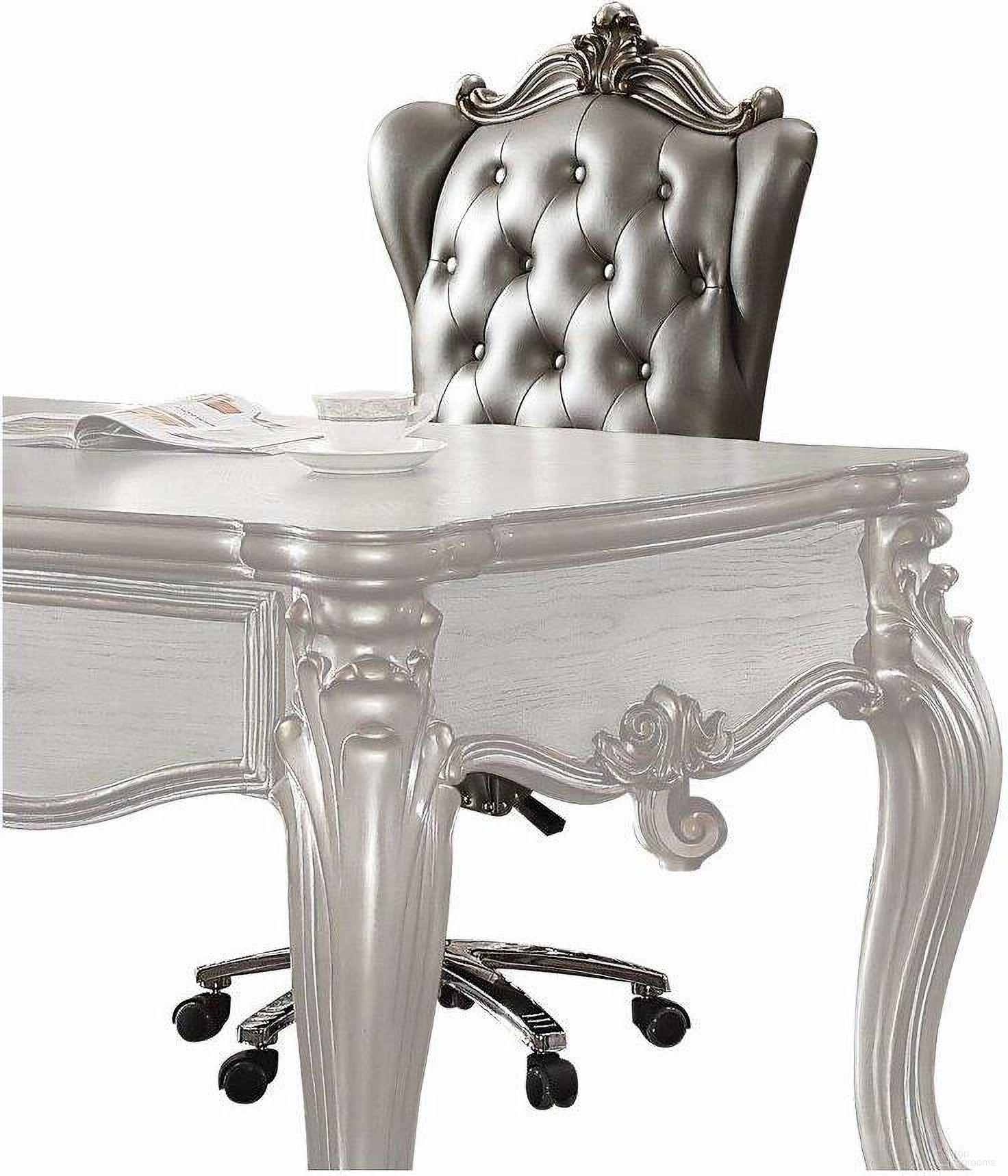 The appearance of Homeroots Silver Pu Antique Platinum Upholstery Poly Resin Executive Chair With Swivel And Lift designed by Homeroots in the traditional interior design. This silver piece of furniture was selected by 1StopBedrooms from to add a touch of cosiness and style into your home. Sku: 347524. Material: Porcelain.