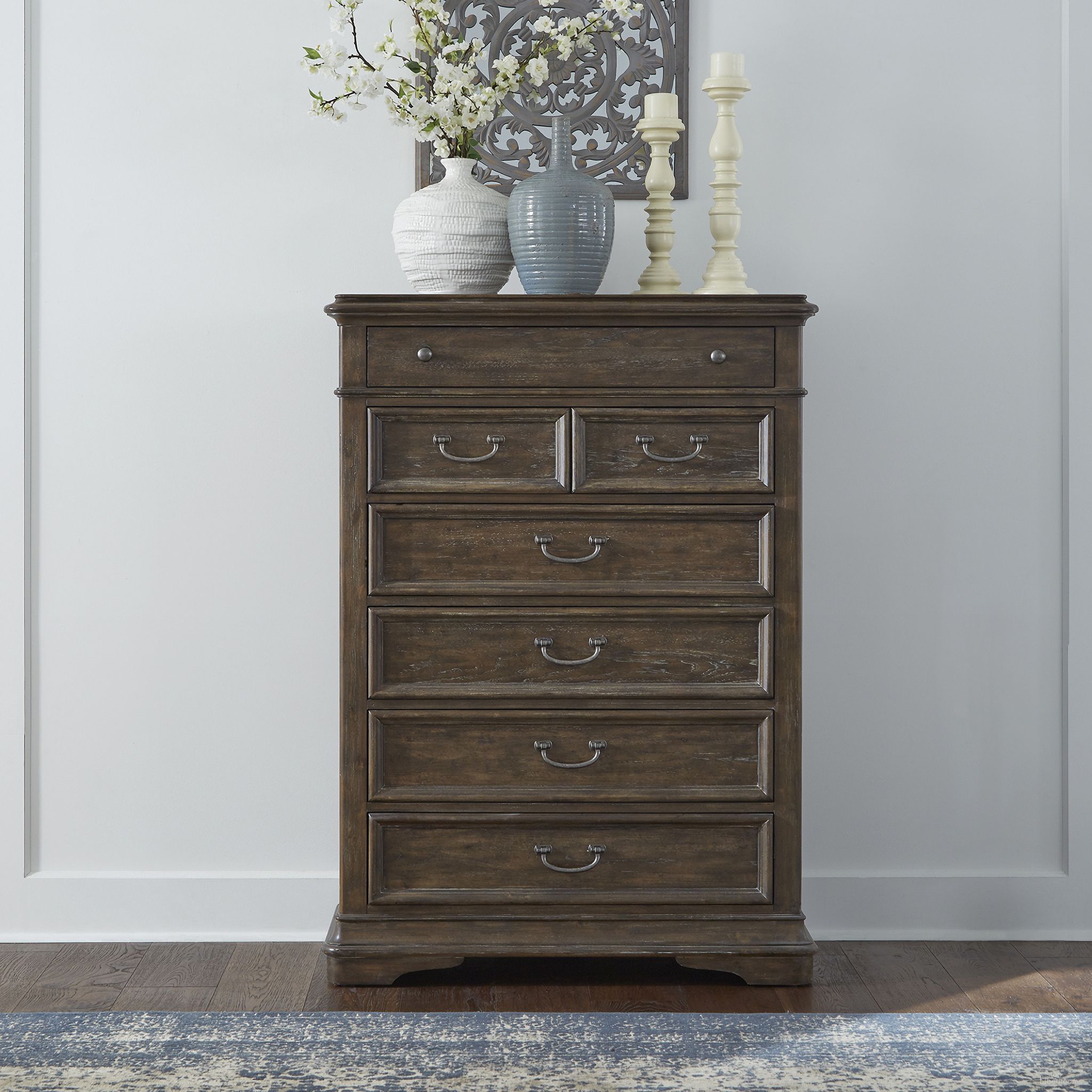 The appearance of Homestead Drawer Chest designed by Liberty in the traditional interior design. This burnished sage piece of furniture was selected by 1StopBedrooms from Homestead Collection to add a touch of cosiness and style into your home. Sku: 693-BR41. Material: Wood.