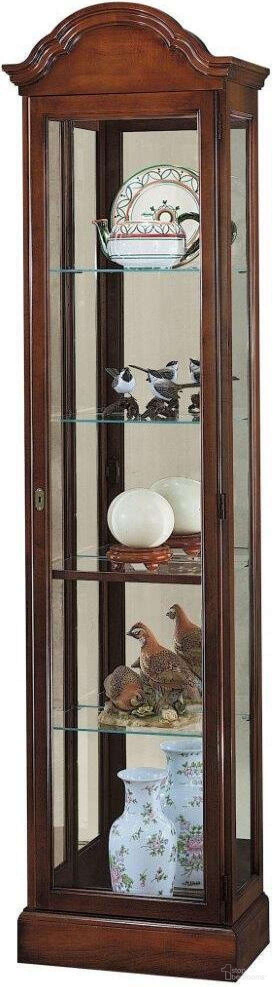 The appearance of Howard Miller Gilmore Curio Cabinet designed by Howard Miller in the modern / contemporary interior design. This brown piece of furniture  was selected by 1StopBedrooms from  to add a touch of cosiness and style into your home. Sku: 680145. Material: Wood.