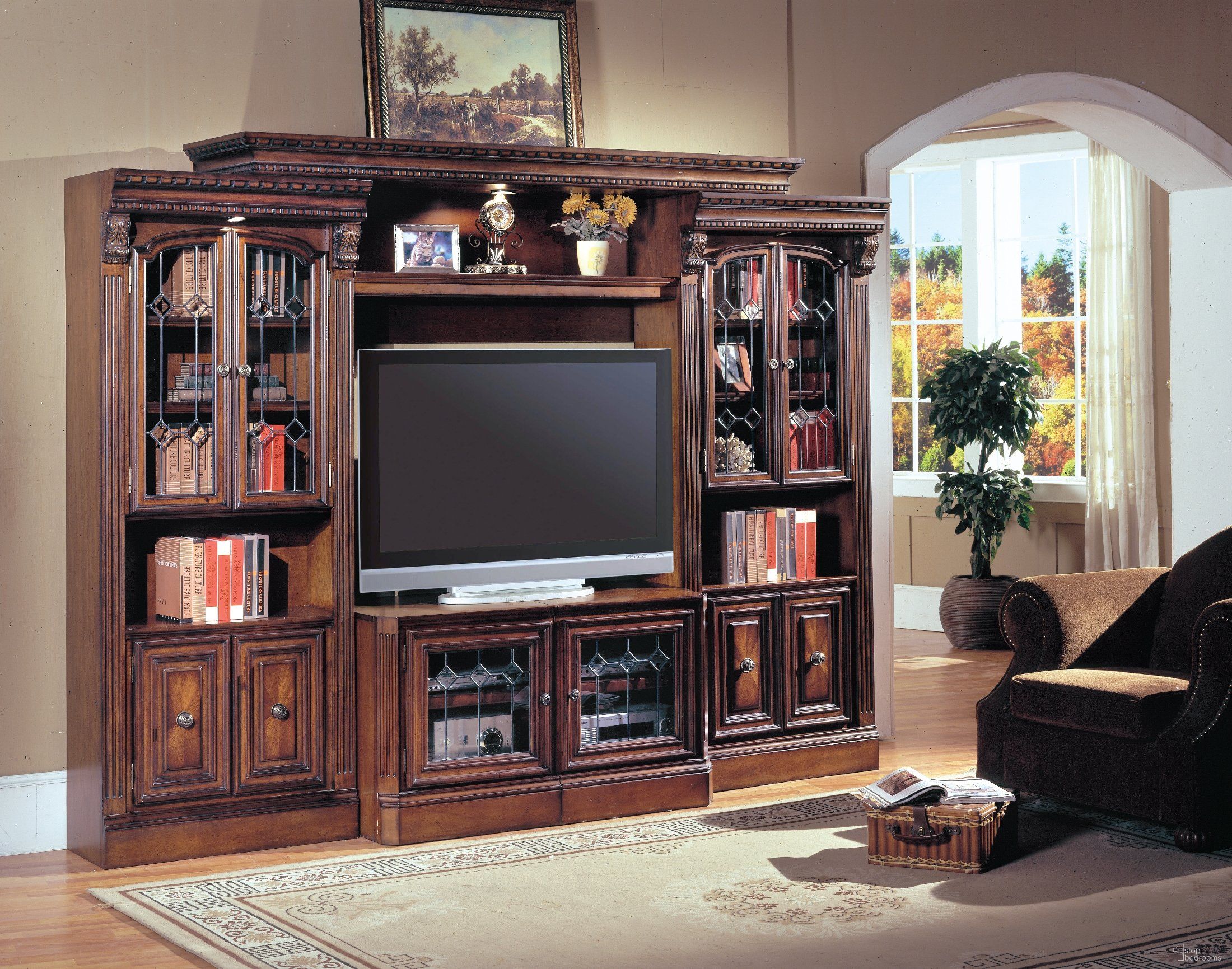 The appearance of Huntington 32" Exp. Glass Door Entertainment Wall Unit designed by Parker House in the traditional interior design. This brown piece of furniture  was selected by 1StopBedrooms from Huntington Collection to add a touch of cosiness and style into your home. Sku: HUN#415X;HUN#400;HUN#440;HUN#440.