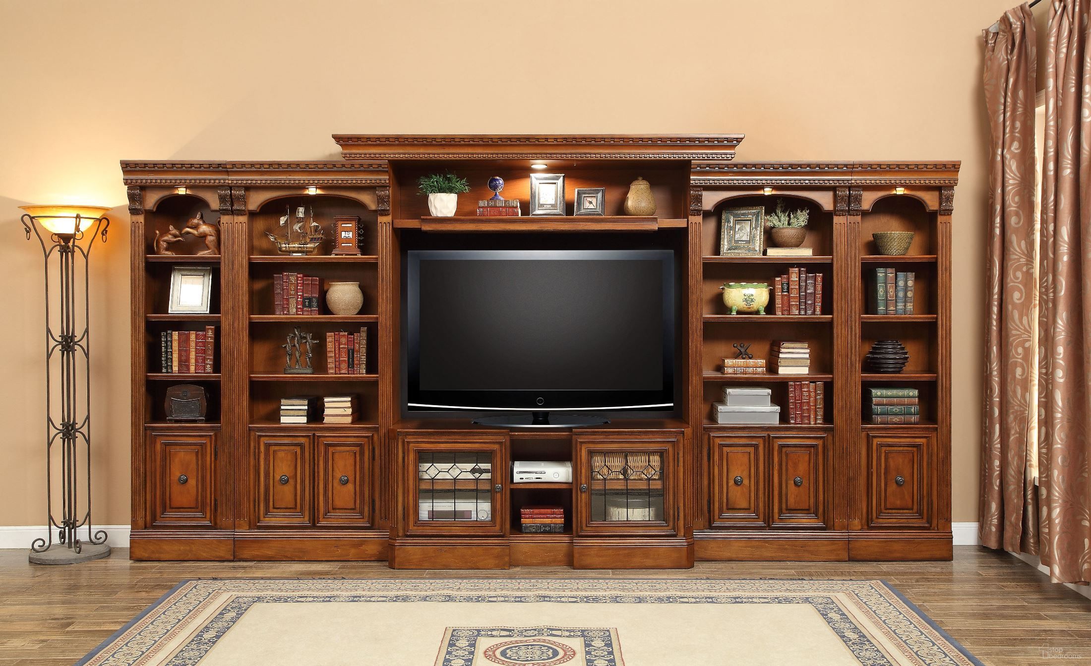 The appearance of Huntington Entertainment Library Wall Unit designed by Parker House in the traditional interior design. This brown piece of furniture was selected by 1StopBedrooms from Huntington Collection to add a touch of cosiness and style into your home. Sku: HUN#415X;HUN#400;HUN#420;HUN#420;HUN#430;HUN#430.