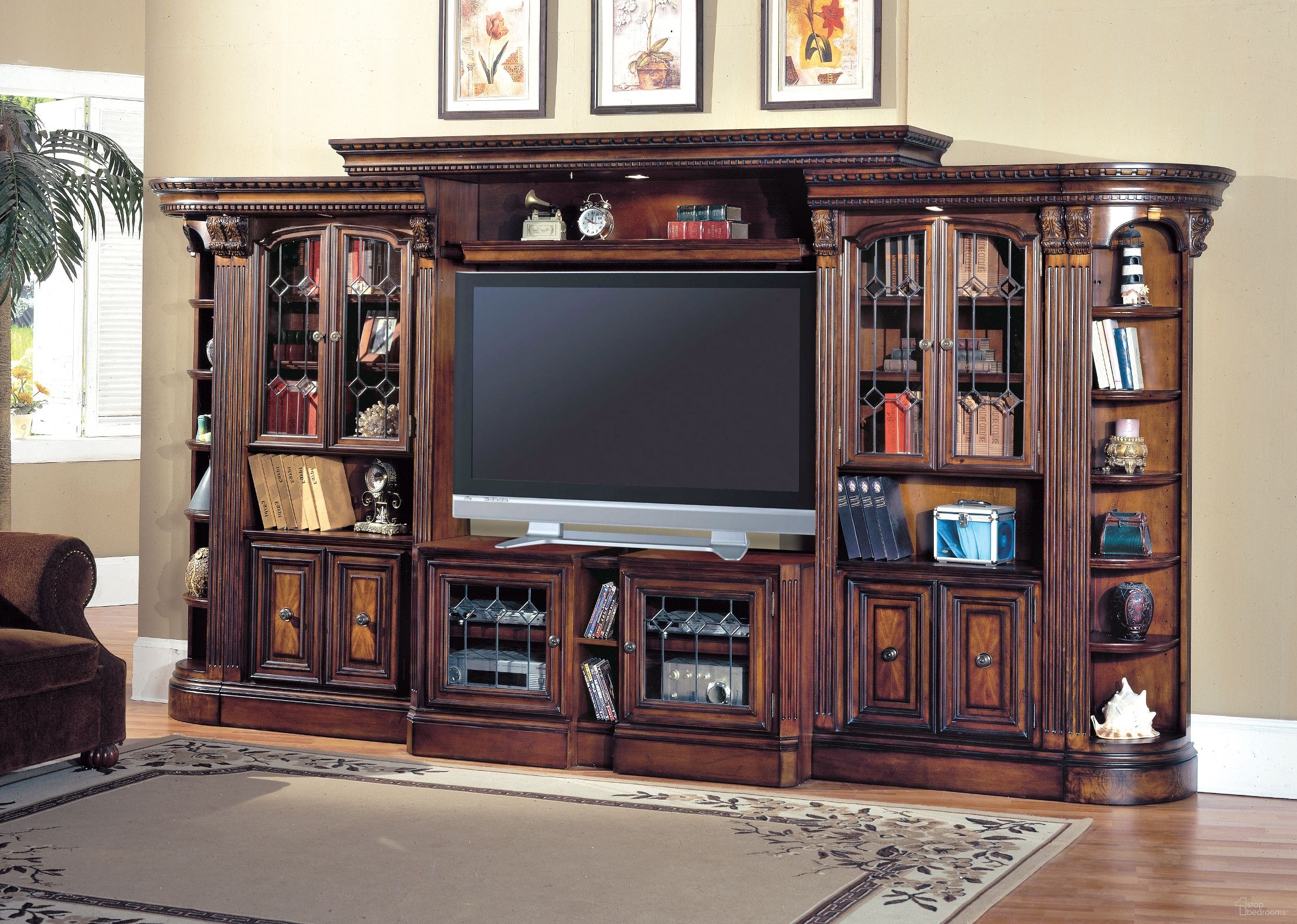 The appearance of Huntington Exp. Large Glass Door Entertainment Wall Unit designed by Parker House in the traditional interior design. This brown piece of furniture was selected by 1StopBedrooms from Huntington Collection to add a touch of cosiness and style into your home. Sku: HUN#415X;HUN#400;HUN#440;HUN#440;HUN#450;HUN#450.