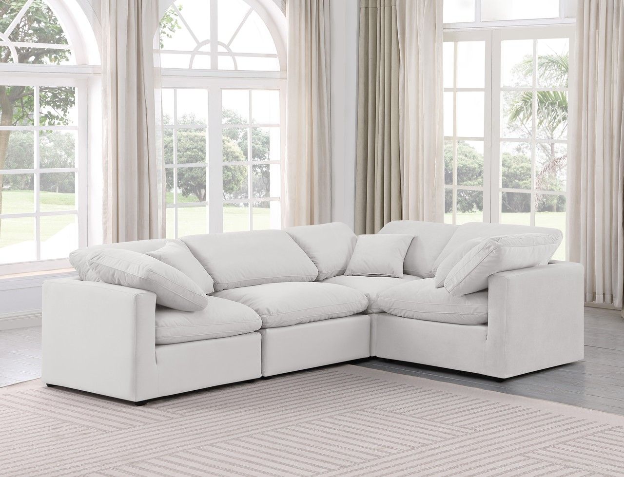 The appearance of Indulge 4 Piece Modular Sectional In Cream Velvet designed by Meridian in the modern / contemporary interior design. This cream velvet piece of furniture was selected by 1StopBedrooms from Indulge Collection to add a touch of cosiness and style into your home. Sku: 147Cream-Armless;147Cream-Corner;147Cream-Corner;147Cream-Corner. Material: Velvet. Layout: L-Shape.