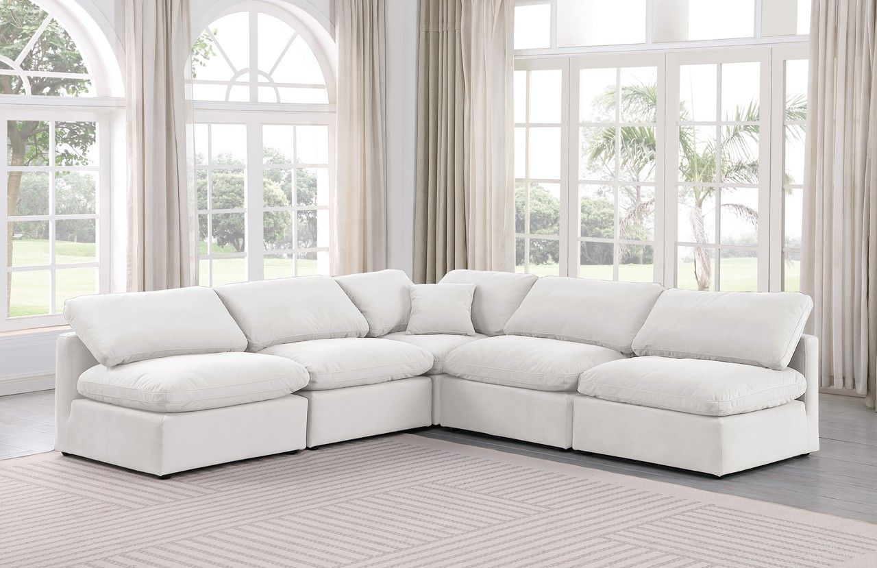 The appearance of Indulge 5 Piece Modular Sectional In Cream Velvet designed by Meridian in the modern / contemporary interior design. This cream velvet piece of furniture  was selected by 1StopBedrooms from Indulge Collection to add a touch of cosiness and style into your home. Sku: 147Cream-Armless;147Cream-Armless;147Cream-Armless;147Cream-Armless;147Cream-Corner. Material: Velvet.