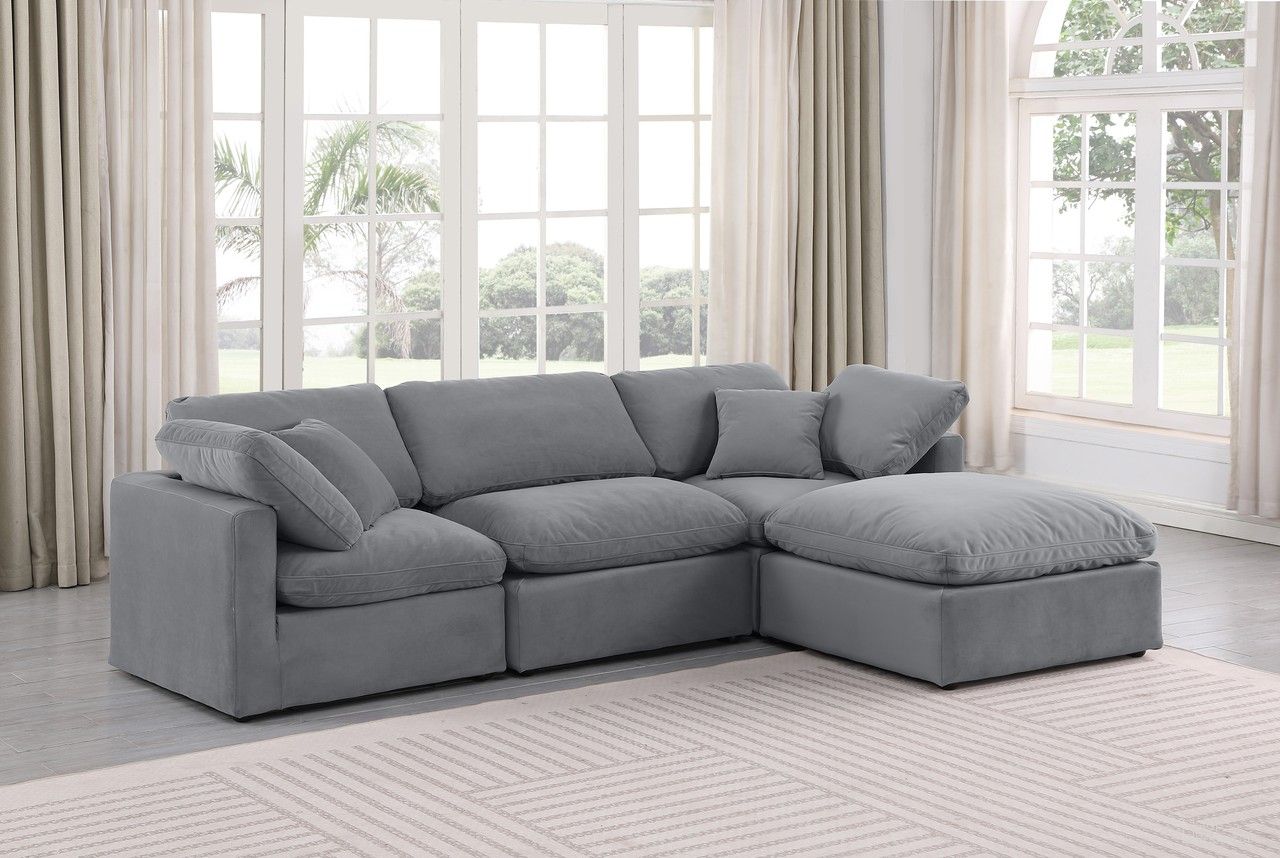 The appearance of Indulge 4 Piece Modular Sectional In Grey Velvet designed by Meridian in the modern / contemporary interior design. This grey velvet piece of furniture  was selected by 1StopBedrooms from Indulge Collection to add a touch of cosiness and style into your home. Sku: 147Grey-Armless;147Grey-Corner;147Grey-Corner;147Grey-Ott. Material: Velvet.