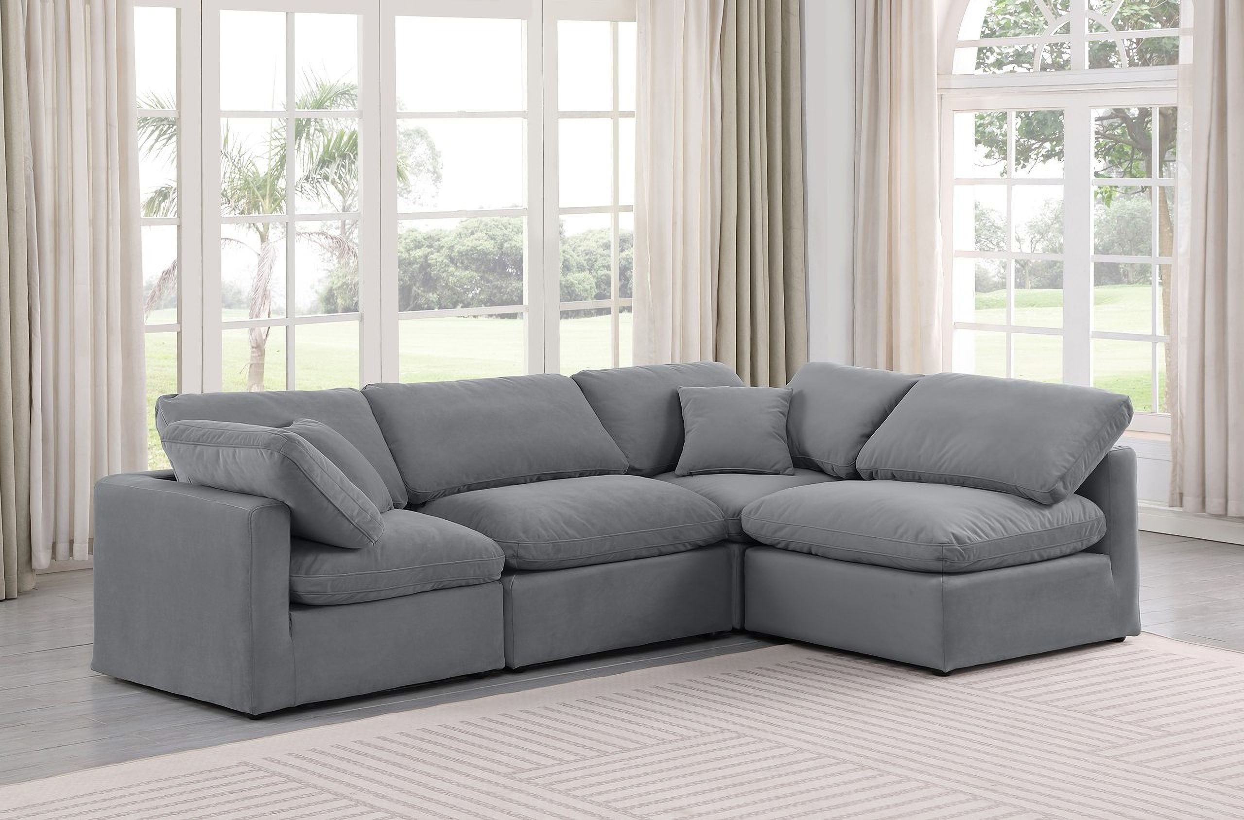 The appearance of Indulge 4 Piece Modular Sectional In Grey Velvet designed by Meridian in the modern / contemporary interior design. This grey velvet piece of furniture  was selected by 1StopBedrooms from Indulge Collection to add a touch of cosiness and style into your home. Sku: 147Grey-Armless;147Grey-Armless;147Grey-Corner;147Grey-Corner. Material: Velvet. Layout: L-Shape.