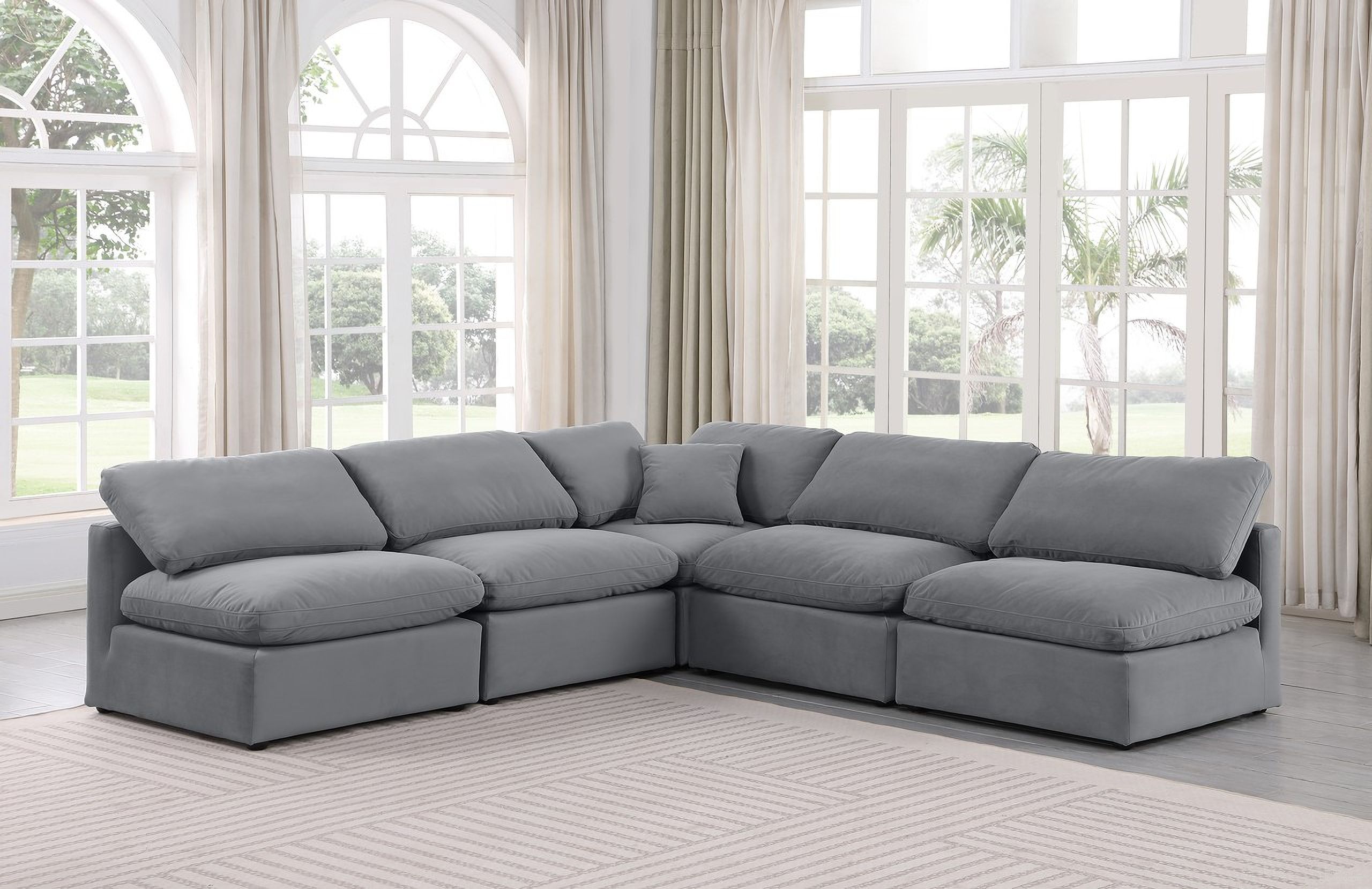 The appearance of Indulge 5 Piece Modular Sectional In Grey Velvet designed by Meridian in the modern / contemporary interior design. This grey velvet piece of furniture  was selected by 1StopBedrooms from Indulge Collection to add a touch of cosiness and style into your home. Sku: 147Grey-Armless;147Grey-Armless;147Grey-Armless;147Grey-Armless;147Grey-Corner. Material: Velvet.
