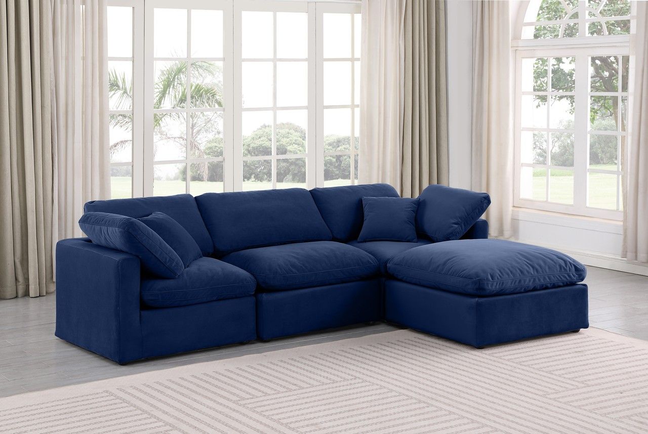 The appearance of Indulge 4 Piece Modular Sectional In Navy Velvet designed by Meridian in the modern / contemporary interior design. This navy velvet piece of furniture  was selected by 1StopBedrooms from Indulge Collection to add a touch of cosiness and style into your home. Sku: 147Navy-Armless;147Navy-Corner;147Navy-Corner;147Navy-Ott. Material: Velvet.