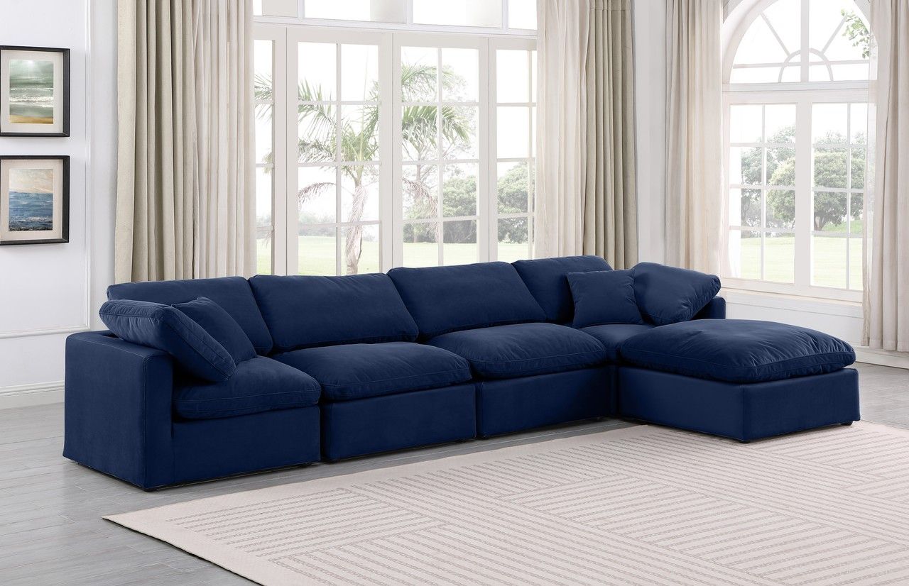 The appearance of Indulge 5 Piece Modular Sectional In Navy Velvet designed by Meridian in the modern / contemporary interior design. This navy velvet piece of furniture  was selected by 1StopBedrooms from Indulge Collection to add a touch of cosiness and style into your home. Sku: 147Navy-Armless;147Navy-Armless;147Navy-Corner;147Navy-Corner;147Navy-Ott. Material: Velvet.