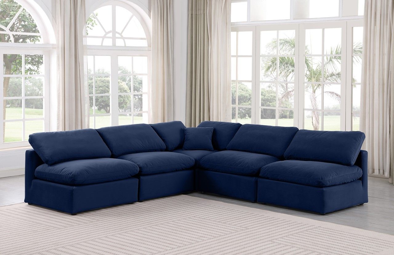 The appearance of Indulge 5 Piece Modular Sectional In Navy Velvet designed by Meridian in the modern / contemporary interior design. This navy velvet piece of furniture  was selected by 1StopBedrooms from Indulge Collection to add a touch of cosiness and style into your home. Sku: 147Navy-Armless;147Navy-Armless;147Navy-Armless;147Navy-Armless;147Navy-Corner. Material: Velvet.