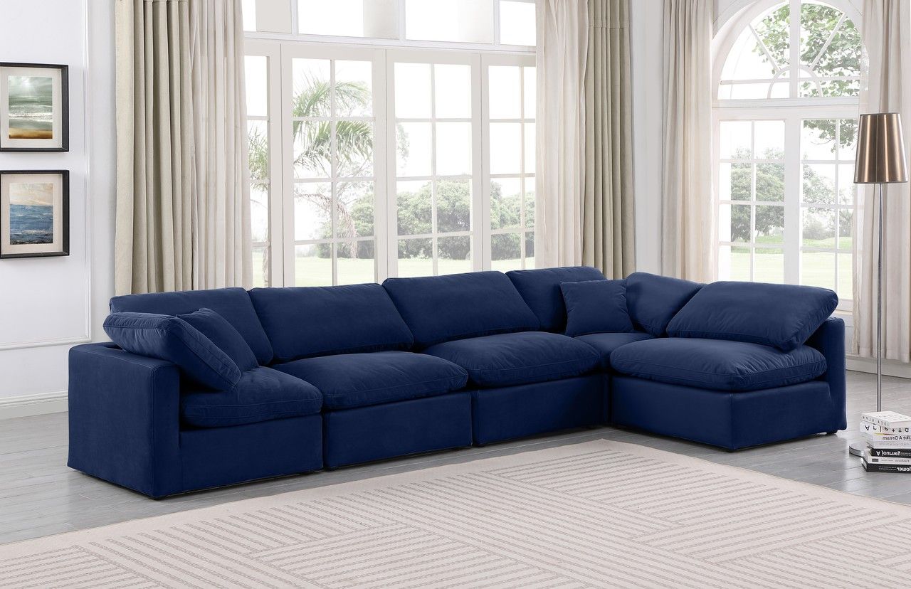 The appearance of Indulge 5 Piece Modular Sectional In Navy Velvet designed by Meridian in the modern / contemporary interior design. This navy velvet piece of furniture was selected by 1StopBedrooms from Indulge Collection to add a touch of cosiness and style into your home. Sku: 147Navy-Armless;147Navy-Armless;147Navy-Armless;147Navy-Corner;147Navy-Corner. Material: Velvet. Layout: L-Shape.
