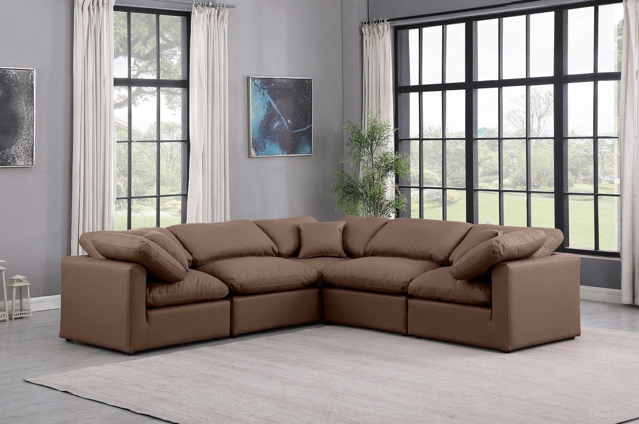 The appearance of Indulge Vegan Leather 5 Piece Modular Sectional In Brown designed by Meridian in the modern / contemporary interior design. This brown piece of furniture was selected by 1StopBedrooms from Indulge Collection to add a touch of cosiness and style into your home. Sku: 146Brown-Armless;146Brown-Armless;146Brown-Corner;146Brown-Corner;146Brown-Corner. Material: Leather. Layout: L-Shape.