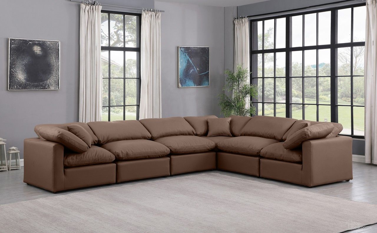 The appearance of Indulge Vegan Leather 6 Piece Modular Sectional In Brown designed by Meridian in the modern / contemporary interior design. This brown piece of furniture  was selected by 1StopBedrooms from Indulge Collection to add a touch of cosiness and style into your home. Sku: 146Brown-Armless;146Brown-Armless;146Brown-Armless;146Brown-Corner;146Brown-Corner;146Brown-Corner. Material: Leather. Layout: L-Shape.