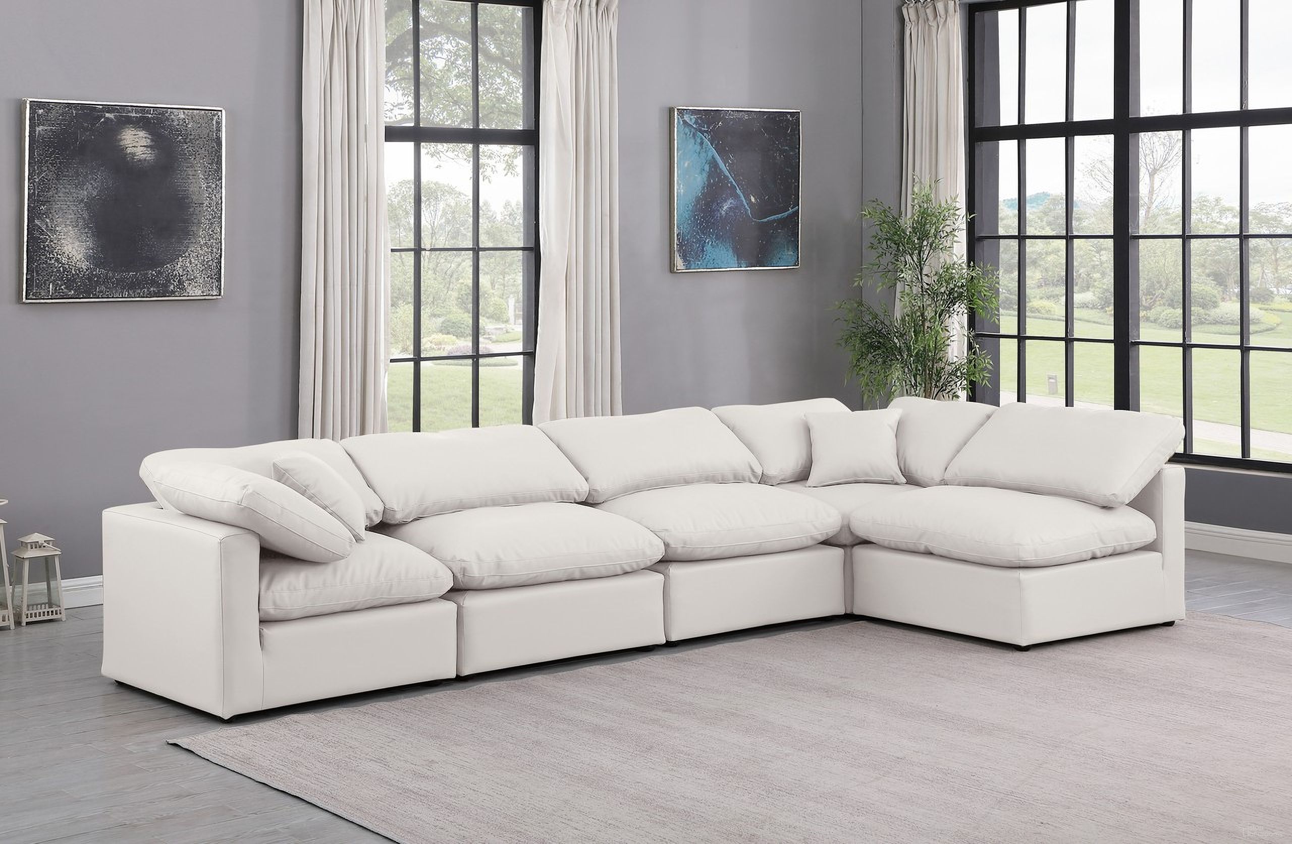 The appearance of Indulge Vegan Leather 5 Piece Modular Sectional In Cream designed by Meridian in the modern / contemporary interior design. This cream piece of furniture  was selected by 1StopBedrooms from Indulge Collection to add a touch of cosiness and style into your home. Sku: 146Cream-Armless;146Cream-Armless;146Cream-Armless;146Cream-Corner;146Cream-Corner. Material: Leather. Layout: L-Shape.