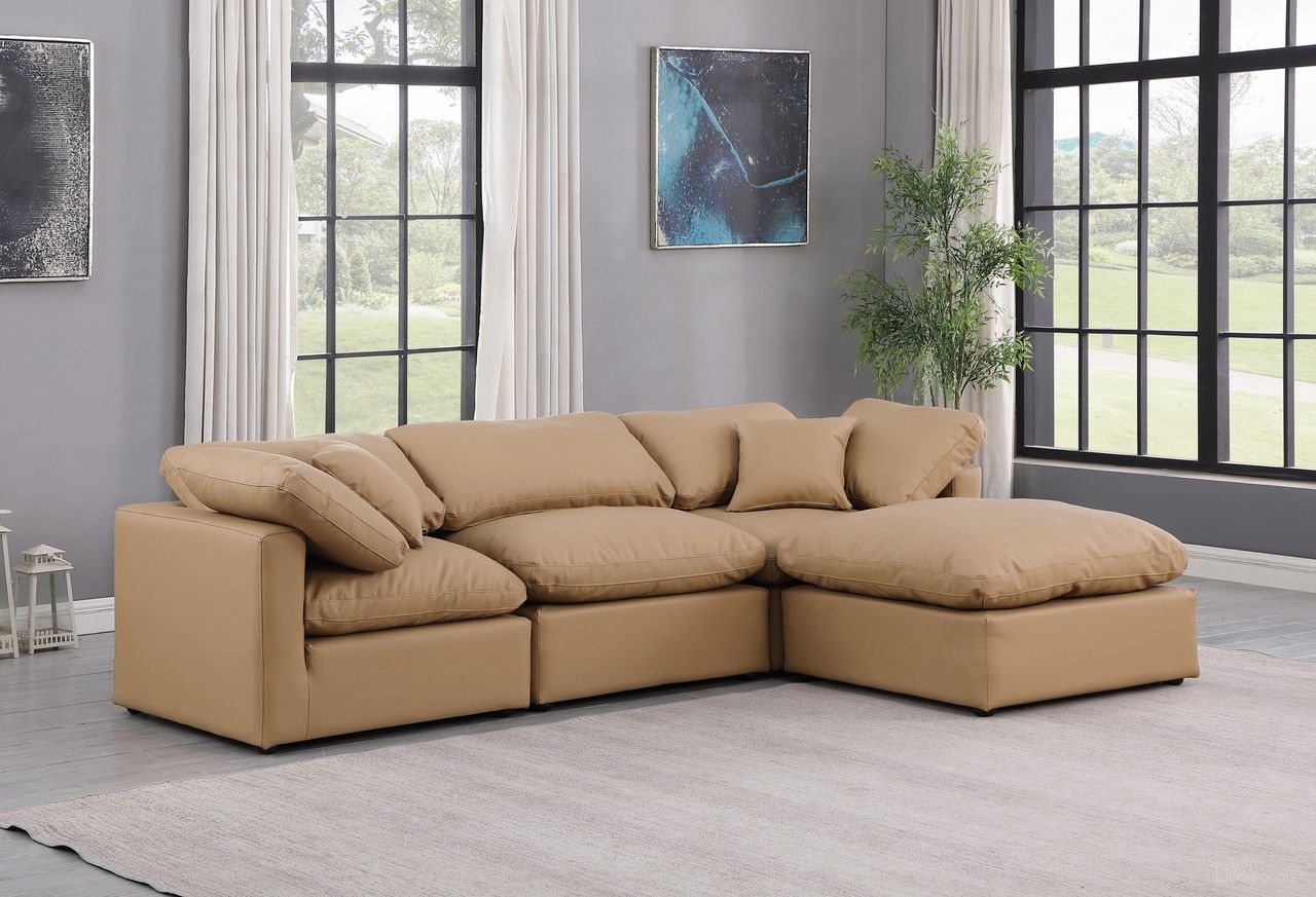 The appearance of Indulge Vegan Leather 4 Piece Modular Sectional In Tan designed by Meridian in the modern / contemporary interior design. This tan piece of furniture was selected by 1StopBedrooms from Indulge Collection to add a touch of cosiness and style into your home. Sku: 146Tan-Armless;146Tan-Corner;146Tan-Corner;146Tan-Ott. Material: Leather.