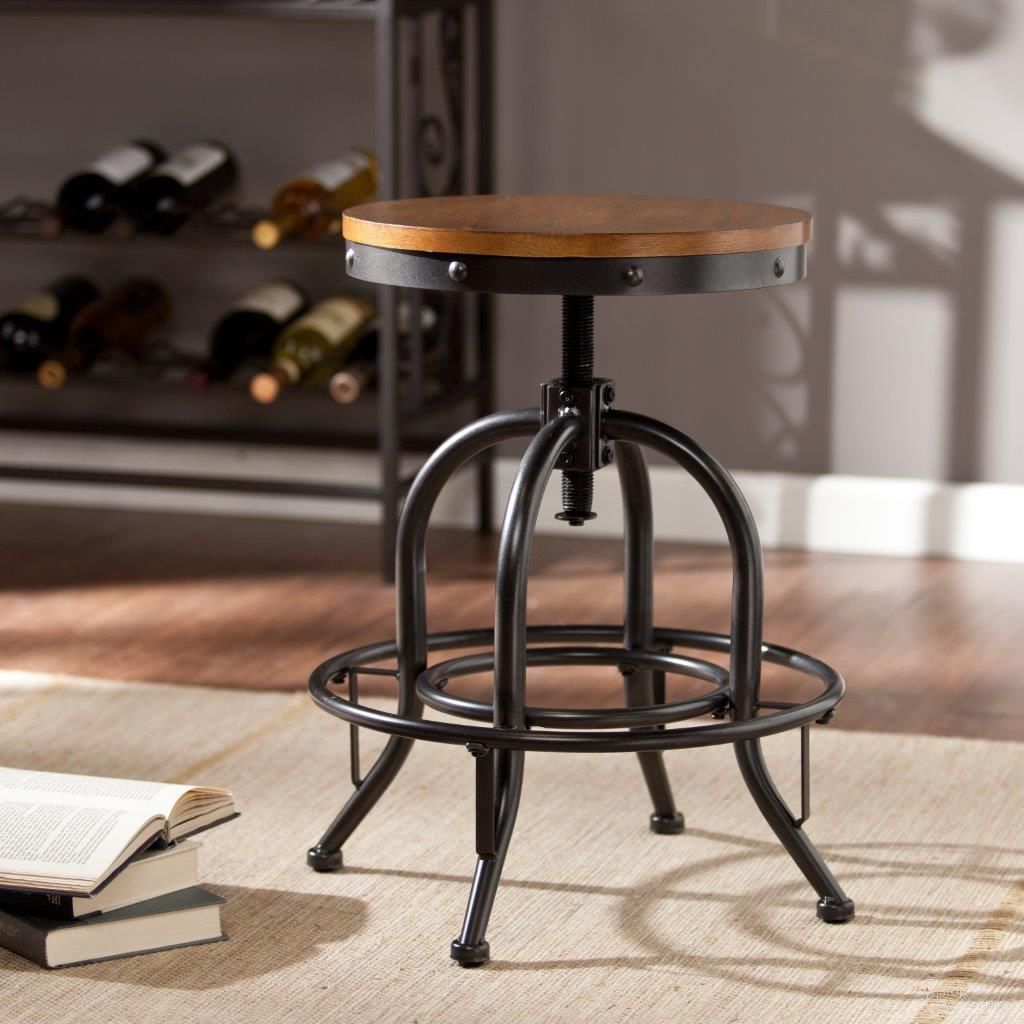 The appearance of Industrial Adjustable Stool designed by SEI Furniture in the industrial interior design. This black piece of furniture was selected by 1StopBedrooms from Industrial Collection to add a touch of cosiness and style into your home. Sku: BC2453. Material: MDF.