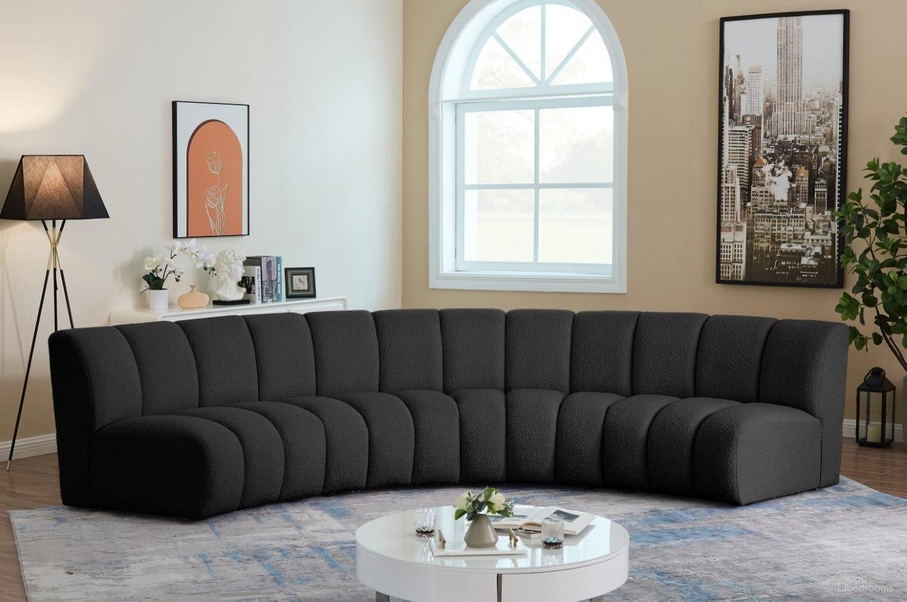 The appearance of Infinity 4-Piece Boucle Fabric Modular Sectional In Black designed by Meridian in the modern / contemporary interior design. This black piece of furniture  was selected by 1StopBedrooms from Infinity Collection to add a touch of cosiness and style into your home. Sku: 643Black-C;643Black-C;643Black-C;643Black-C. Material: Wood. Layout: Curved.