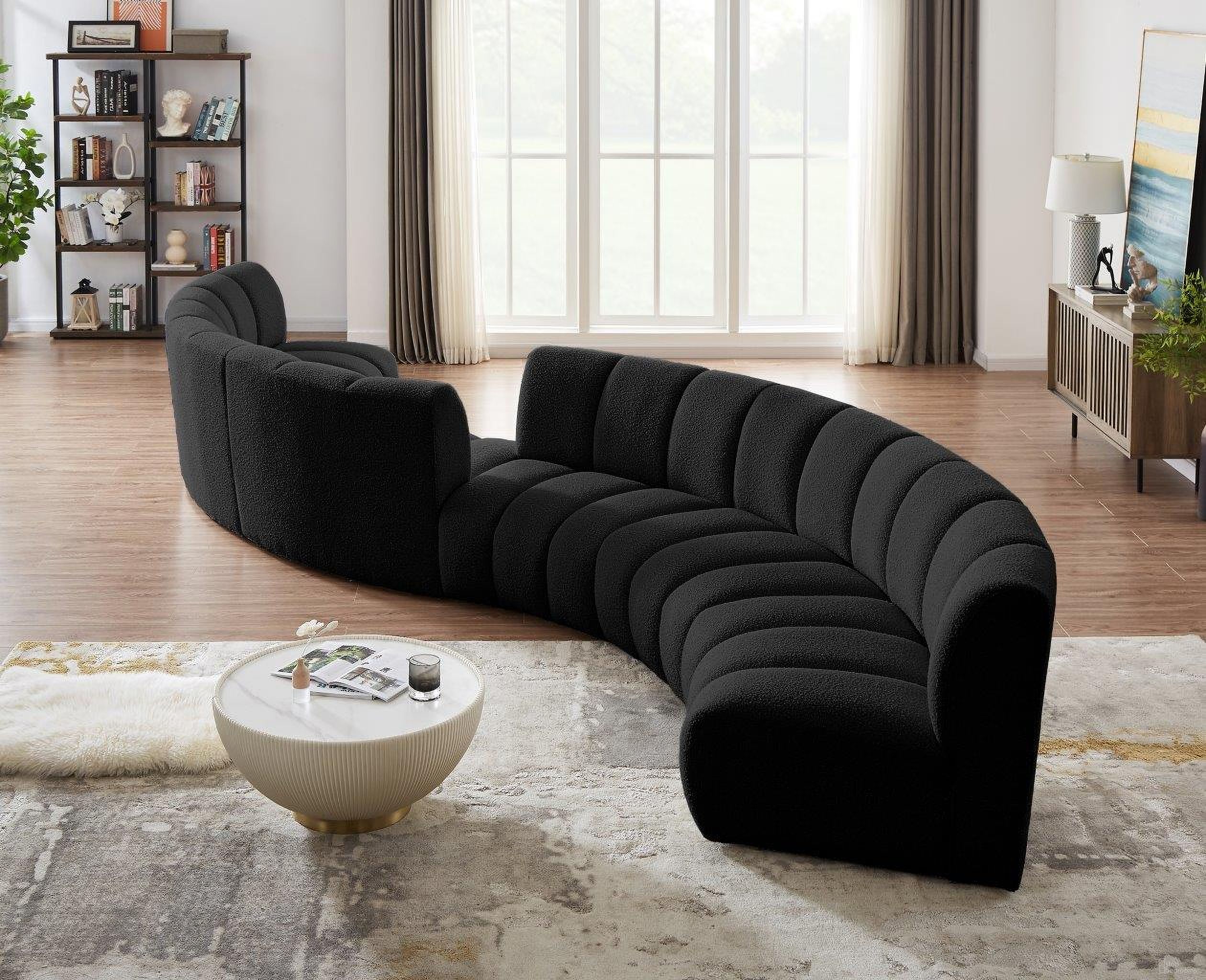 The appearance of Infinity 6-Piece Boucle Fabric Modular Sectional In Black designed by Meridian in the modern / contemporary interior design. This black piece of furniture  was selected by 1StopBedrooms from Infinity Collection to add a touch of cosiness and style into your home. Sku: 643Black-C;643Black-C;643Black-C;643Black-C;643Black-C;643Black-C. Material: Wood. Layout: Curved.