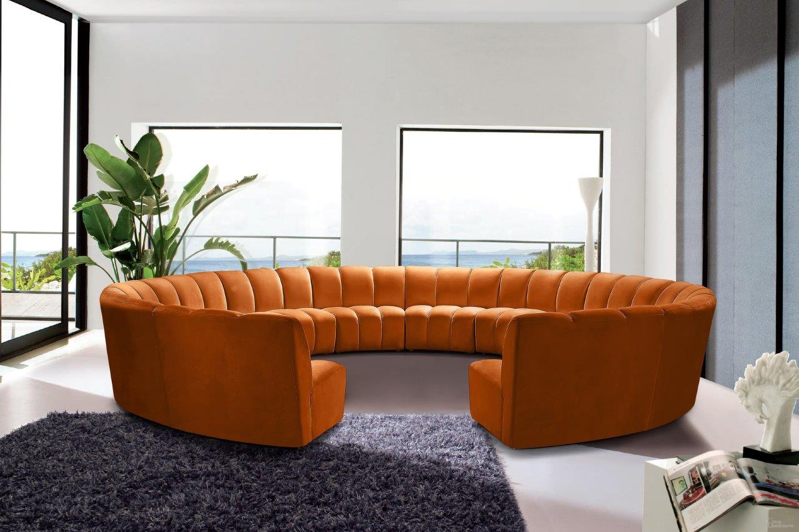 The appearance of Infinity 12-Piece Velvet Modular Sectional In Cognac designed by Meridian in the modern / contemporary interior design. This cognac piece of furniture  was selected by 1StopBedrooms from Infinity Collection to add a touch of cosiness and style into your home. Sku: 638Cognac-C;638Cognac-C;638Cognac-C;638Cognac-C;638Cognac-C;638Cognac-C;638Cognac-C;638Cognac-C;638Cognac-C;638Cognac-C;638Cognac-C;638Cognac-C. Material: Velvet. Layout: Curved.