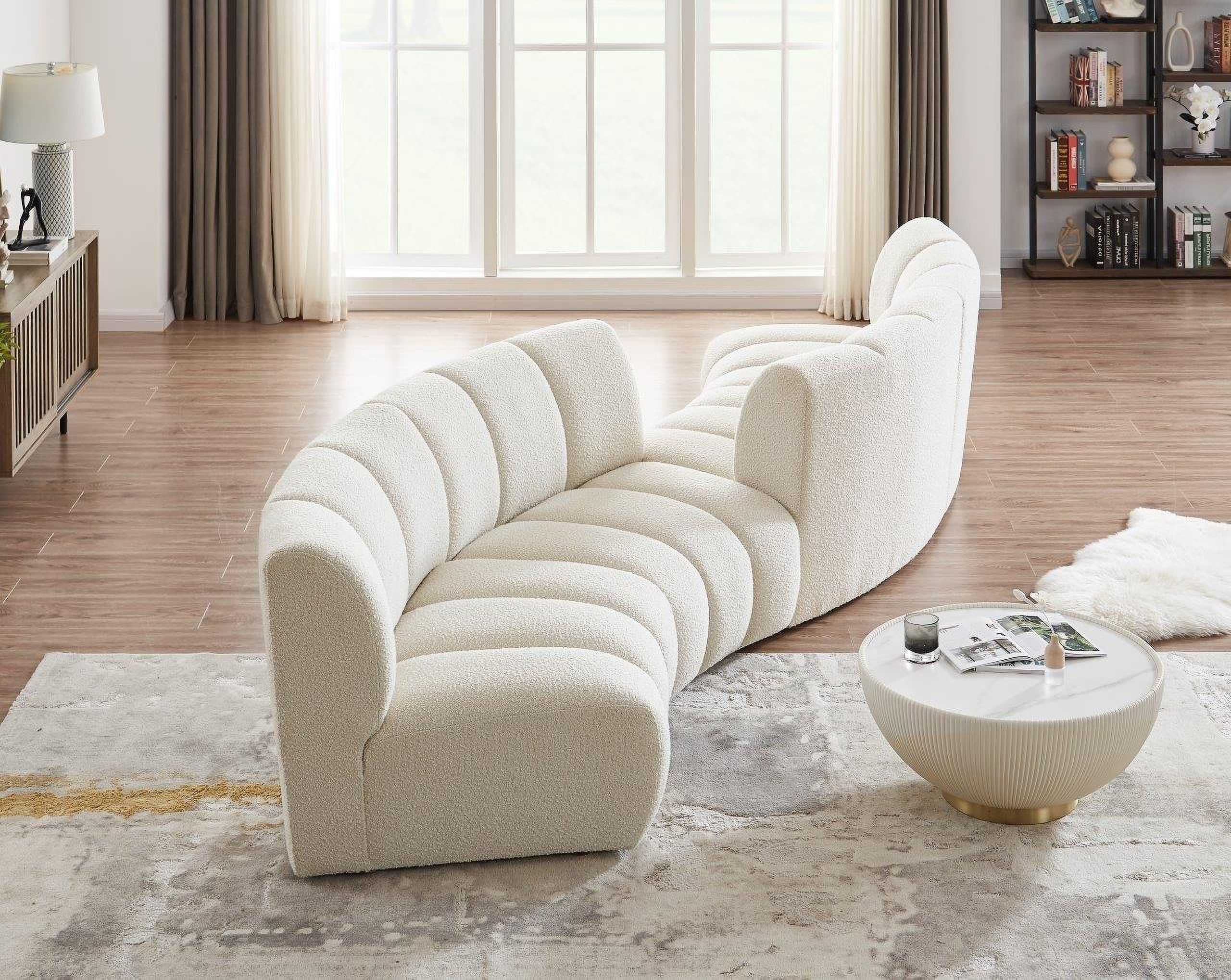 The appearance of Infinity 4-Piece Boucle Fabric Modular Sectional In Cream designed by Meridian in the modern / contemporary interior design. This cream piece of furniture was selected by 1StopBedrooms from Infinity Collection to add a touch of cosiness and style into your home. Sku: 643Cream-C;643Cream-C;643Cream-C;643Cream-C. Layout: Curved. Material: Boucle.