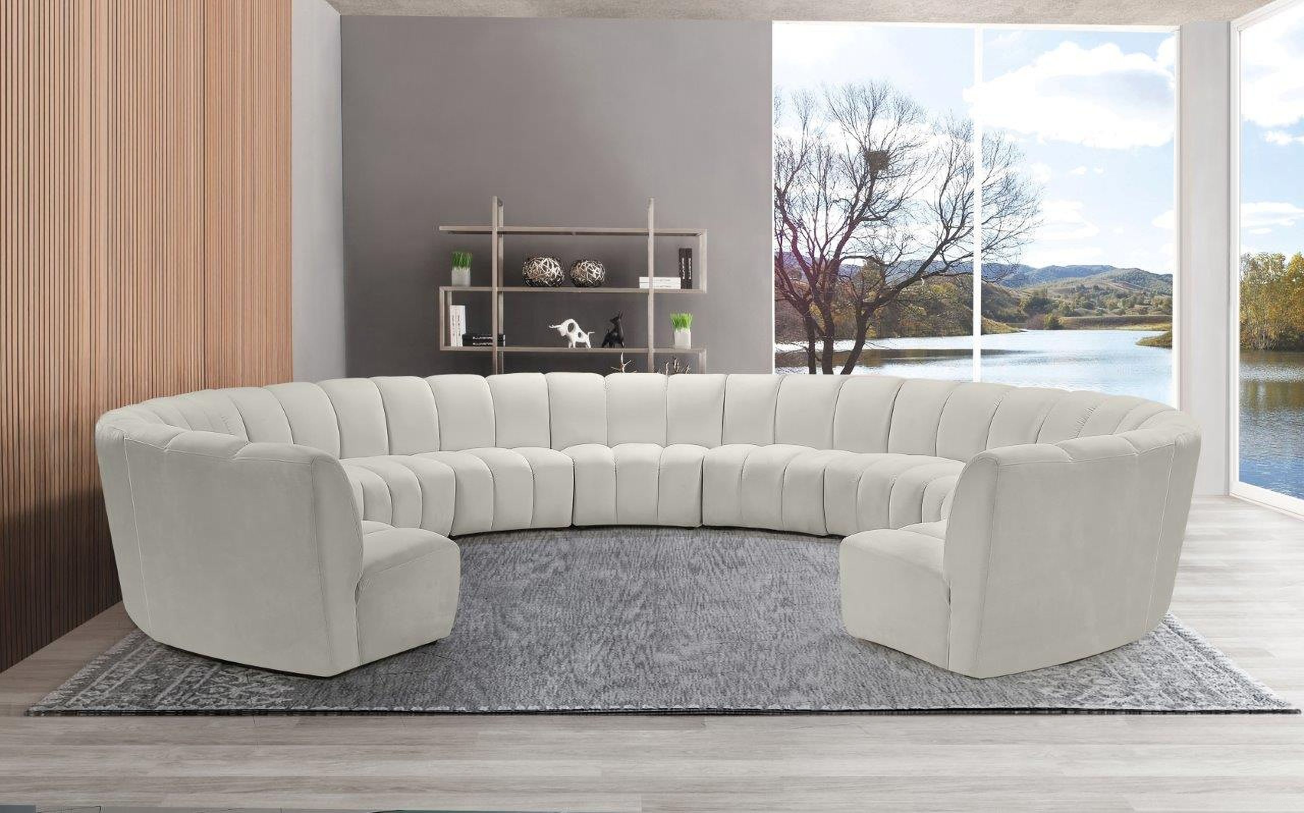 The appearance of Infinity 11-Piece Velvet Modular Sectional In Cream designed by Meridian in the modern / contemporary interior design. This cream velvet piece of furniture  was selected by 1StopBedrooms from Infinity Collection to add a touch of cosiness and style into your home. Sku: 638Cream-C;638Cream-C;638Cream-C;638Cream-C;638Cream-C;638Cream-C;638Cream-C;638Cream-C;638Cream-C;638Cream-C;638Cream-C. Material: Velvet. Layout: Curved.