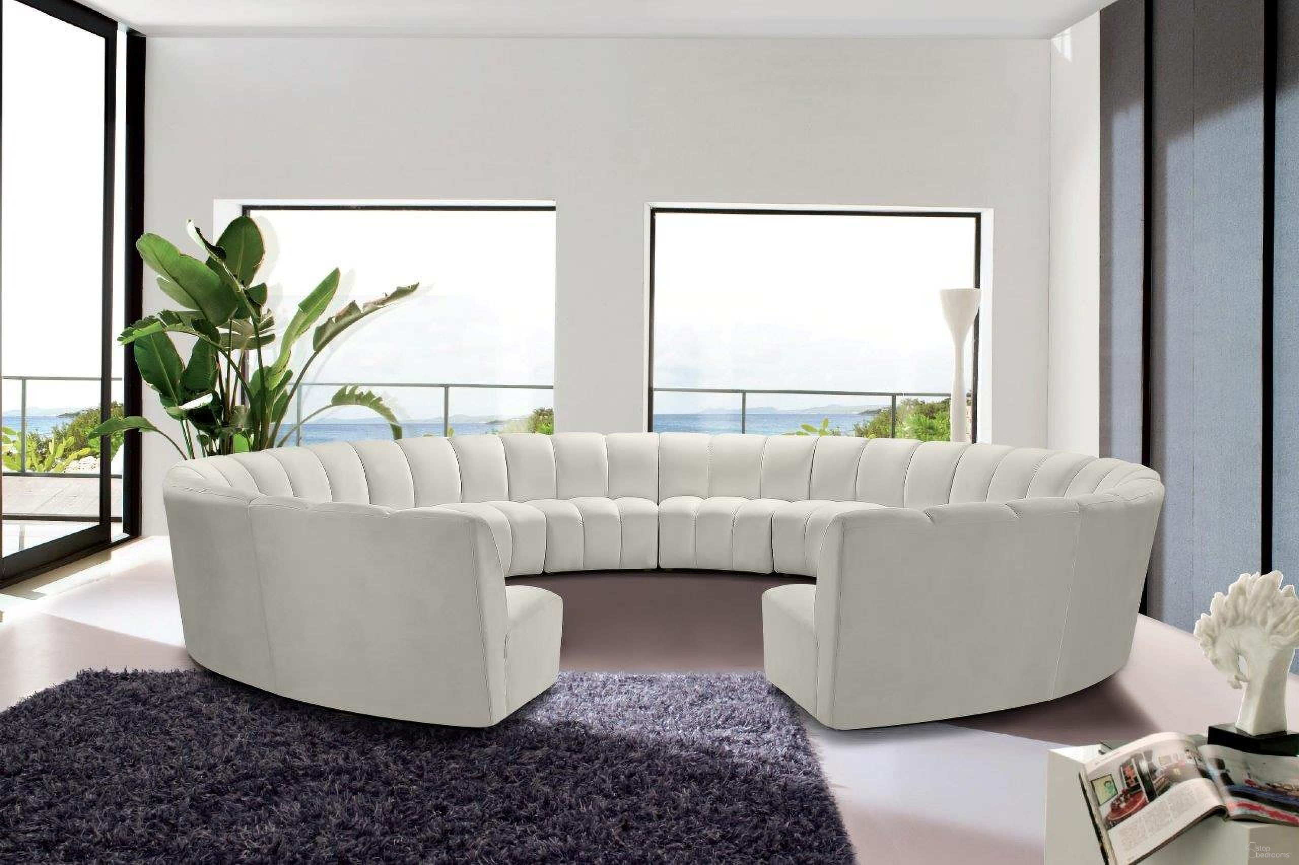 The appearance of Infinity 12-Piece Velvet Modular Sectional In Cream designed by Meridian in the modern / contemporary interior design. This cream velvet piece of furniture  was selected by 1StopBedrooms from Infinity Collection to add a touch of cosiness and style into your home. Sku: 638Cream-C;638Cream-C;638Cream-C;638Cream-C;638Cream-C;638Cream-C;638Cream-C;638Cream-C;638Cream-C;638Cream-C;638Cream-C;638Cream-C. Material: Velvet. Layout: Curved.
