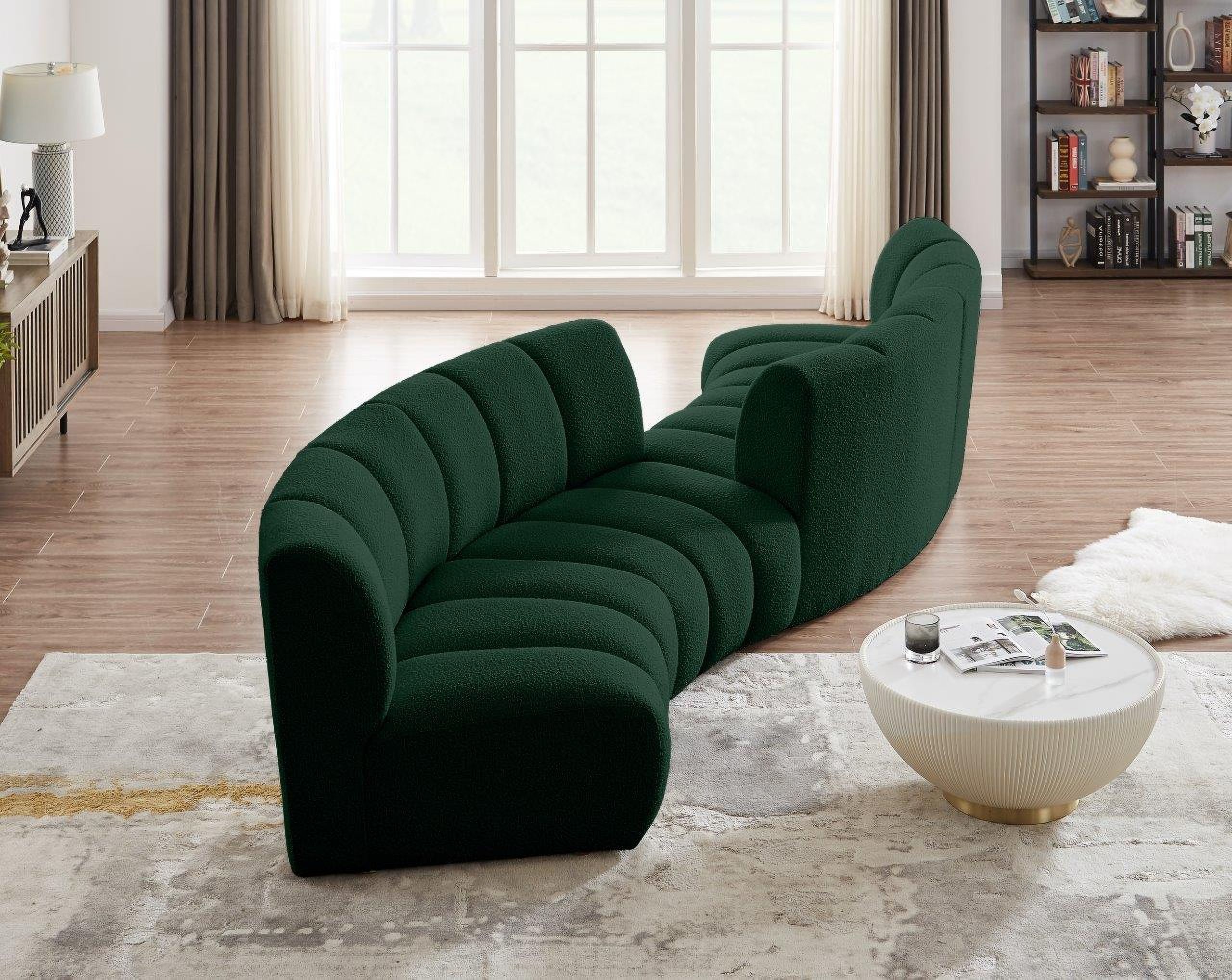 The appearance of Infinity 4-Piece Boucle Fabric Modular Sectional In Green designed by Meridian in the modern / contemporary interior design. This green piece of furniture  was selected by 1StopBedrooms from Infinity Collection to add a touch of cosiness and style into your home. Sku: 643Green-C;643Green-C;643Green-C;643Green-C. Material: Wood. Layout: Curved.