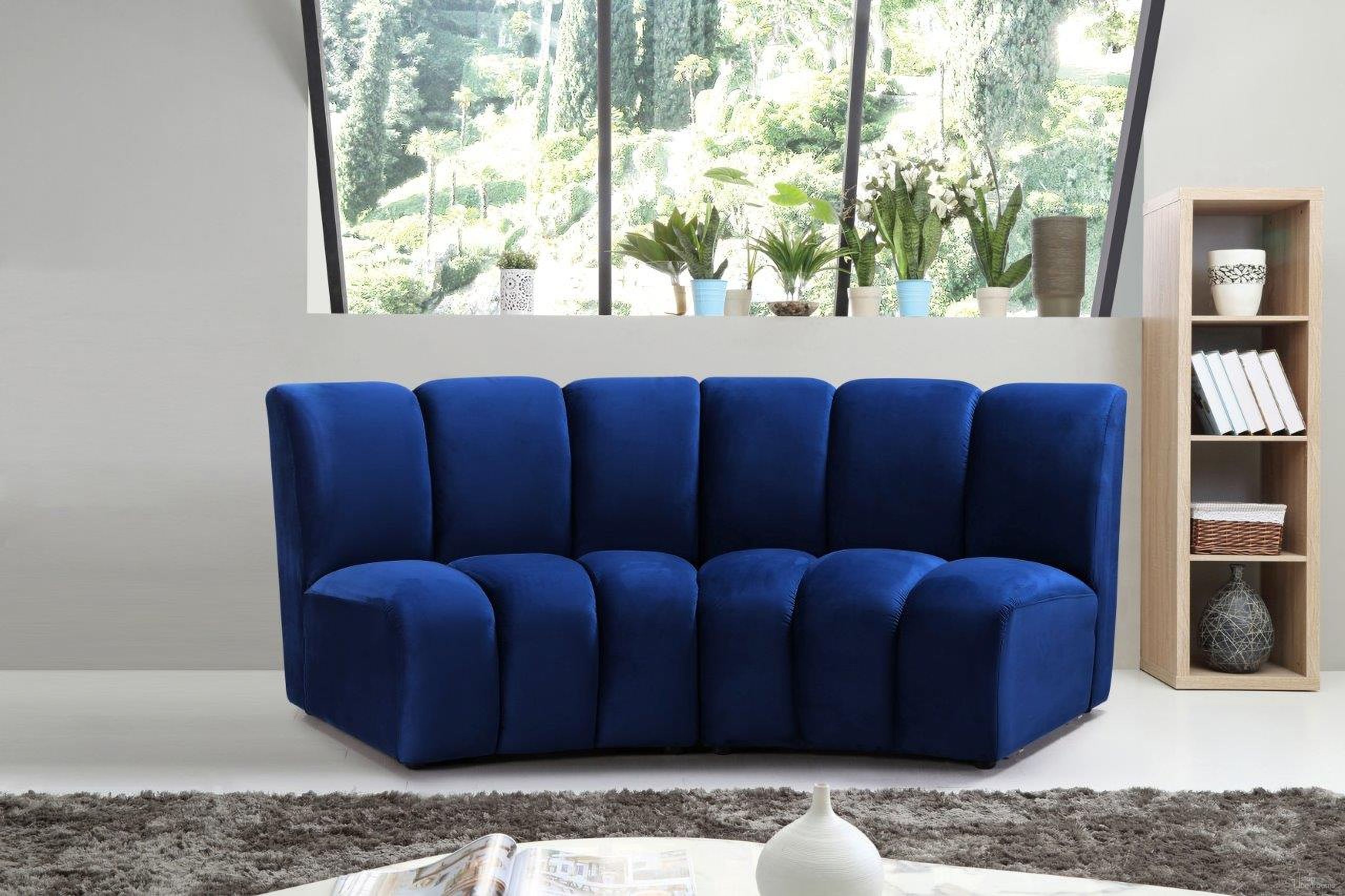 The appearance of Infinity 2-Piece Velvet Modular Sectional In Navy designed by Meridian in the modern / contemporary interior design. This navy piece of furniture was selected by 1StopBedrooms from Infinity Collection to add a touch of cosiness and style into your home. Sku: 638Navy-C;638Navy-C. Material: Velvet. Layout: Curved.