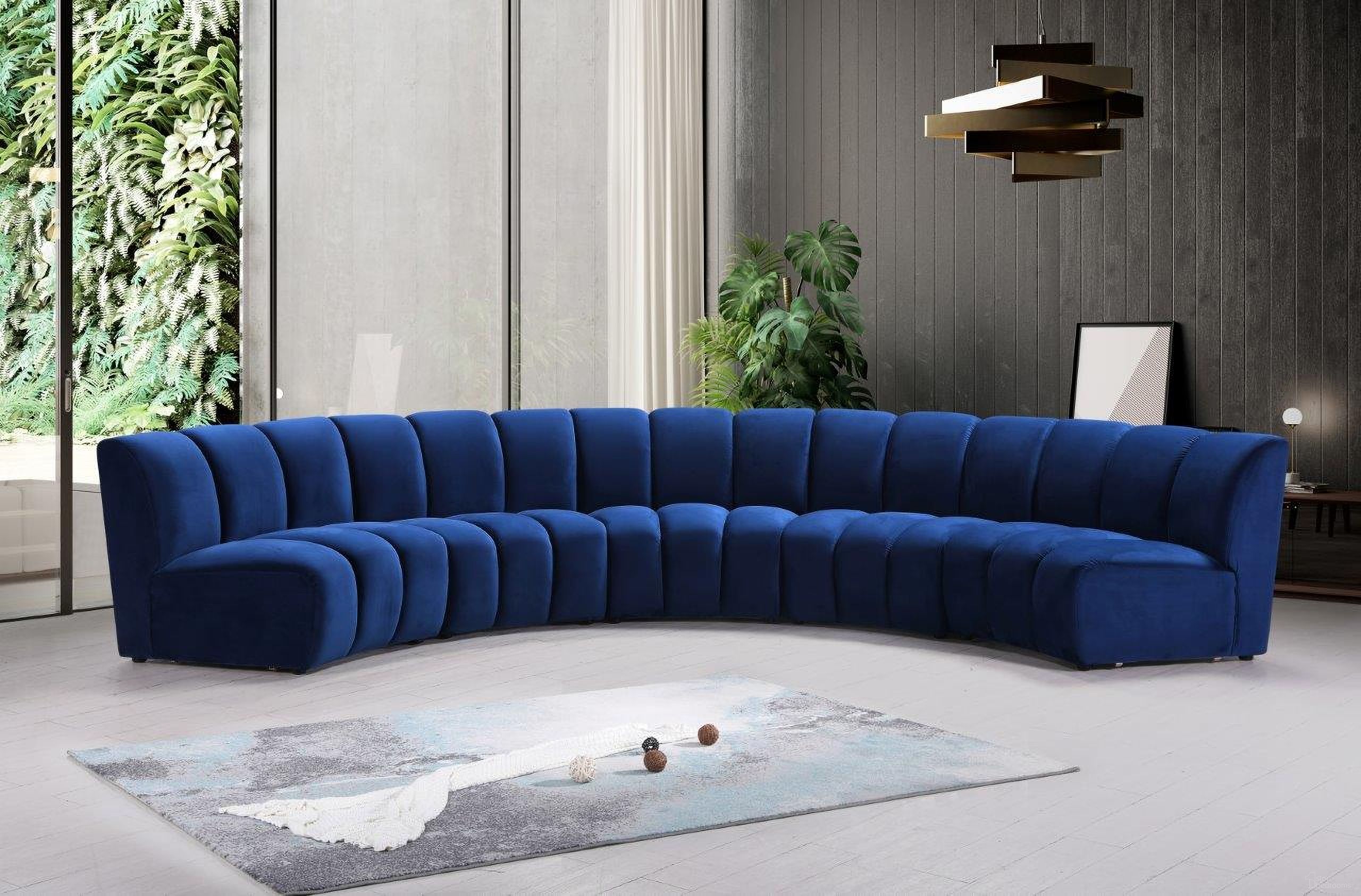 The appearance of Infinity 5-Piece Velvet Modular Sectional In Navy designed by Meridian in the modern / contemporary interior design. This navy piece of furniture was selected by 1StopBedrooms from Infinity Collection to add a touch of cosiness and style into your home. Sku: 638Navy-C;638Navy-C;638Navy-C;638Navy-C;638Navy-C. Material: Velvet. Layout: Curved.