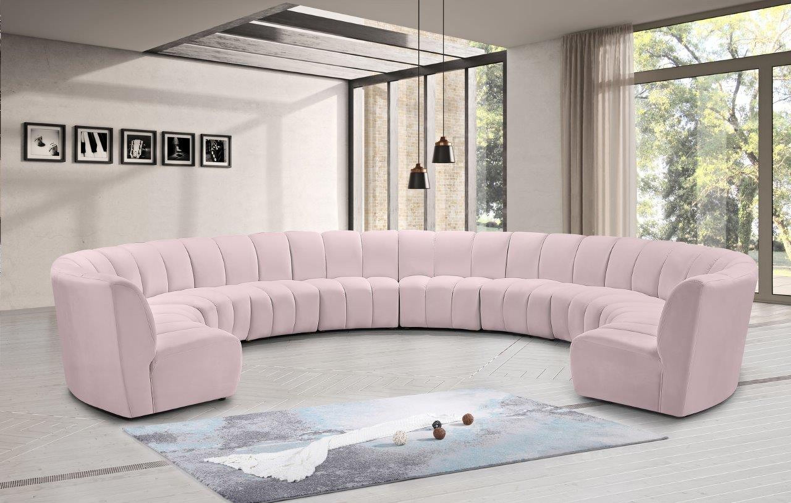 The appearance of Infinity 10-Piece Velvet Modular Sectional In Pink designed by Meridian in the modern / contemporary interior design. This pink piece of furniture was selected by 1StopBedrooms from Infinity Collection to add a touch of cosiness and style into your home. Sku: 638Pink-C;638Pink-C;638Pink-C;638Pink-C;638Pink-C;638Pink-C;638Pink-C;638Pink-C;638Pink-C;638Pink-C. Material: Velvet. Layout: Curved.