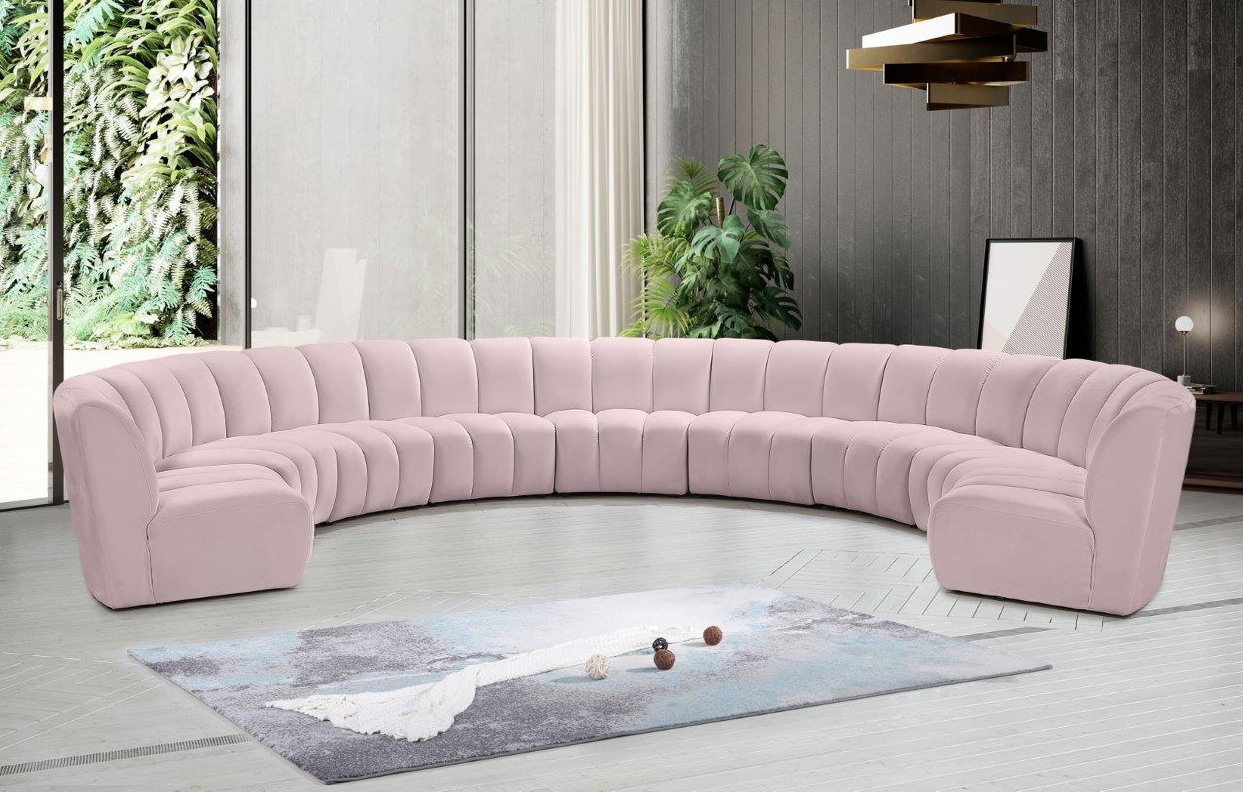 The appearance of Infinity 9-Piece Velvet Modular Sectional In Pink designed by Meridian in the modern / contemporary interior design. This pink piece of furniture was selected by 1StopBedrooms from Infinity Collection to add a touch of cosiness and style into your home. Sku: 638Pink-C;638Pink-C;638Pink-C;638Pink-C;638Pink-C;638Pink-C;638Pink-C;638Pink-C;638Pink-C. Material: Velvet. Layout: Curved.