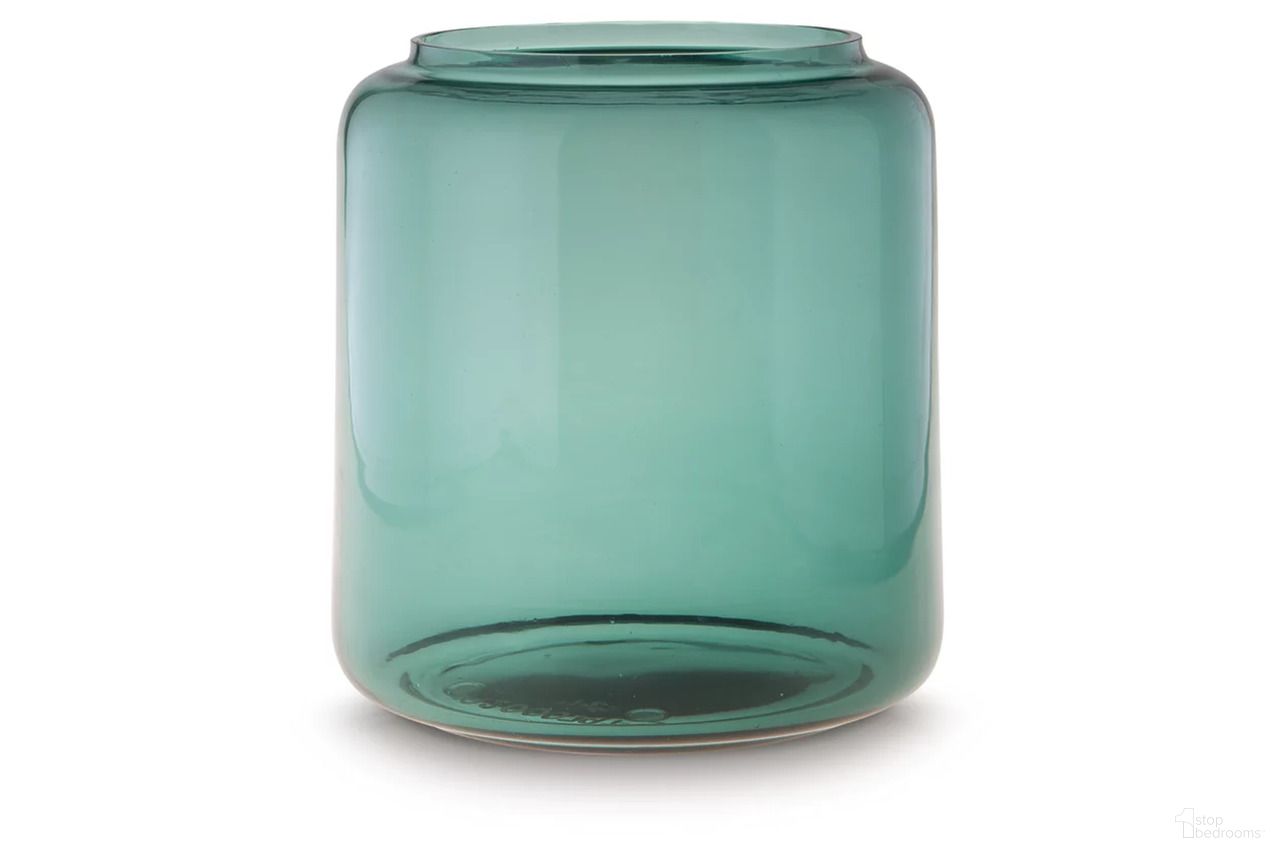 The appearance of Inisland Vase In Teal designed by Signature Design by Ashley in the modern / contemporary interior design. This teal piece of furniture  was selected by 1StopBedrooms from Inisland Collection to add a touch of cosiness and style into your home. Sku: A2000797. Material: Glass.
