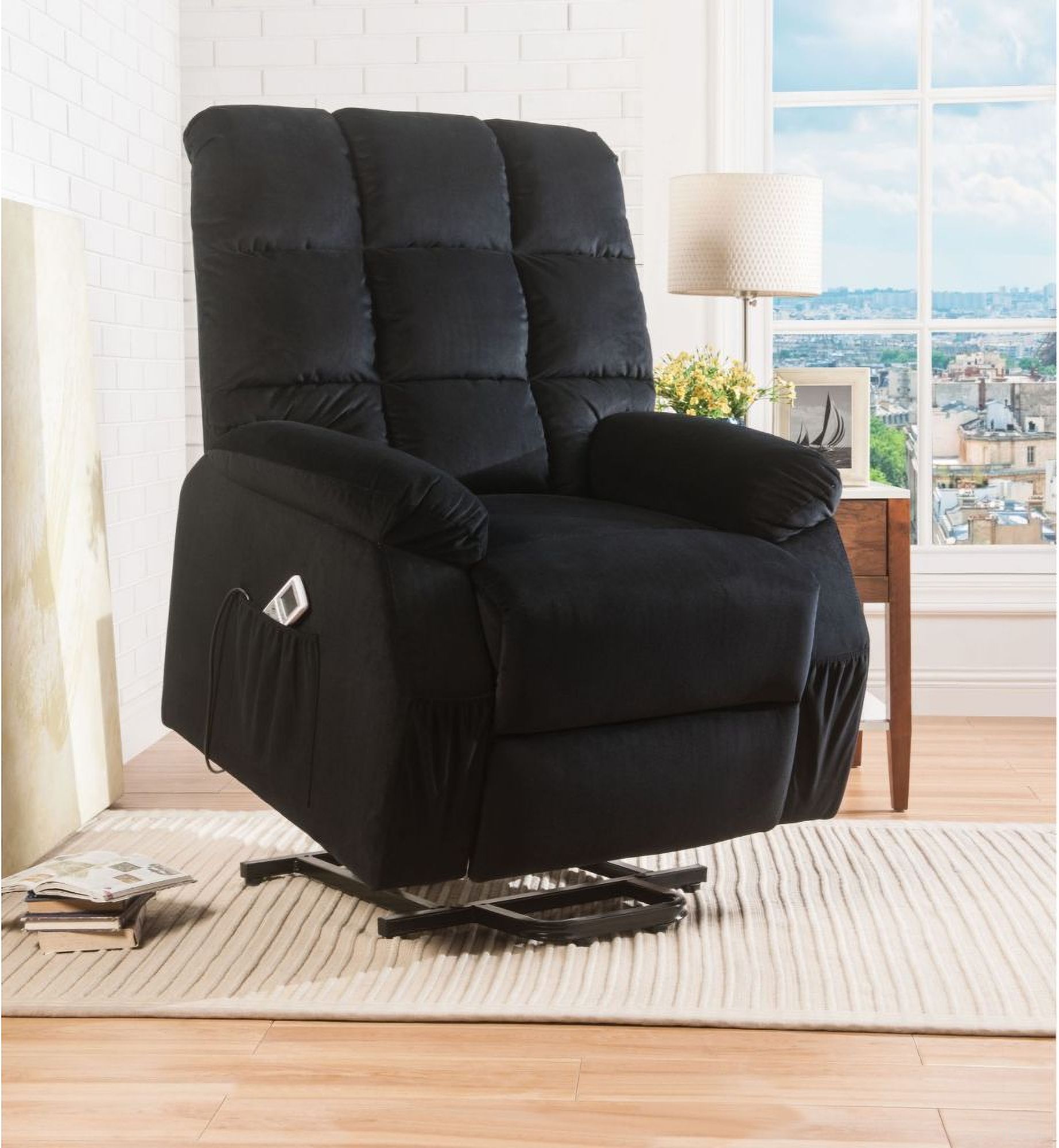 The appearance of Ipompea Black Velvet Power Lift and Massage Recliner designed by ACME in the modern / contemporary interior design. This black piece of furniture was selected by 1StopBedrooms from Ipompea Collection to add a touch of cosiness and style into your home. Sku: 59262. Material: Velvet.