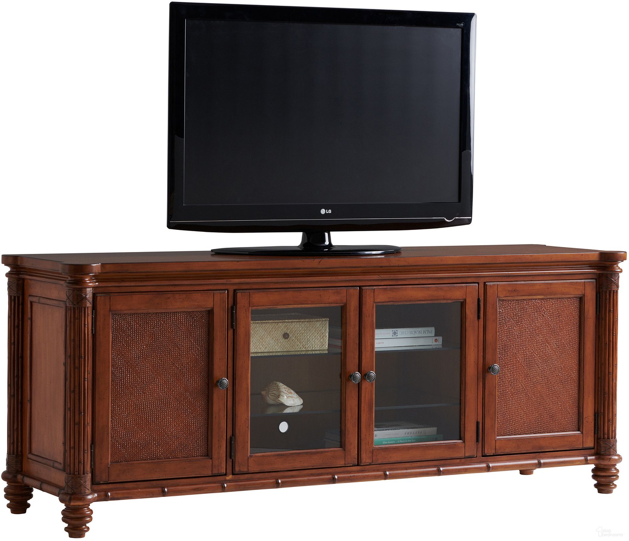 The appearance of Island Estate Blake Island Media Console In Plantation designed by Tommy Bahama in the traditional interior design. This plantation piece of furniture was selected by 1StopBedrooms from Island Estate Collection to add a touch of cosiness and style into your home. Sku: 531-908. Material: Rattan.