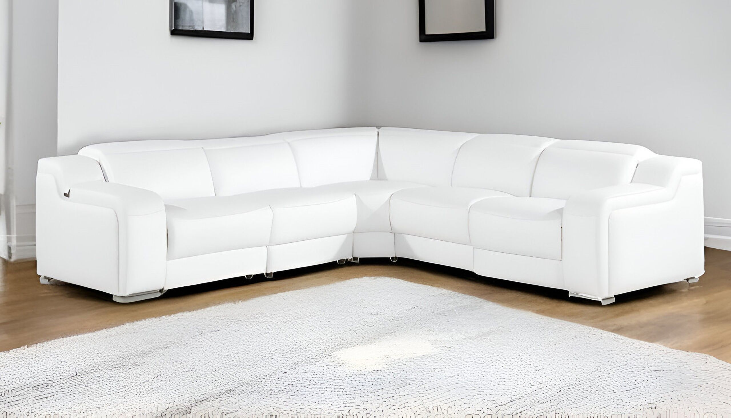 The appearance of Italian Leather Power Reclining L Shaped Five Piece Corner Sectional In White designed by Homeroots in the modern / contemporary interior design. This white piece of furniture  was selected by 1StopBedrooms from  to add a touch of cosiness and style into your home. Sku: 544993. Material: Leather. Layout: L-Shape.
