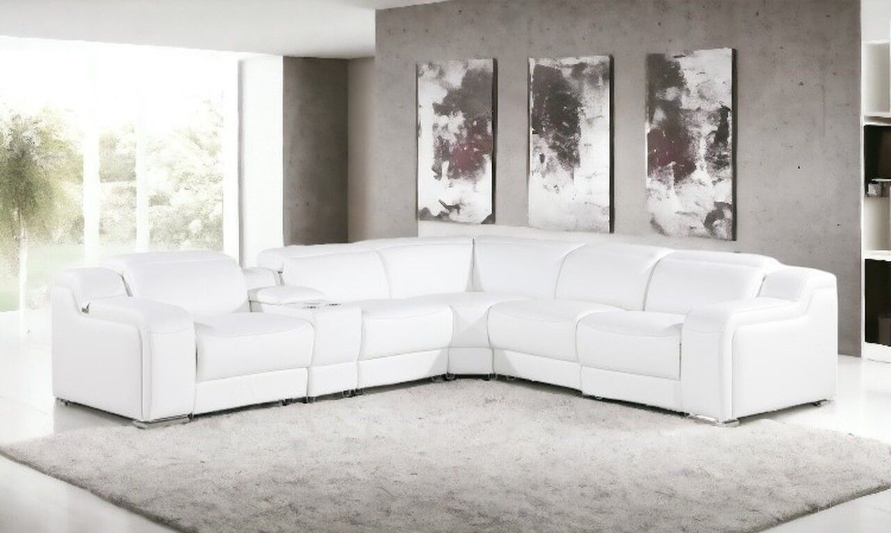 The appearance of Italian Leather Power Reclining L Shaped Six Piece Corner Sectional with Console In White designed by Homeroots in the modern / contemporary interior design. This white piece of furniture  was selected by 1StopBedrooms from  to add a touch of cosiness and style into your home. Sku: 544994. Material: Leather.