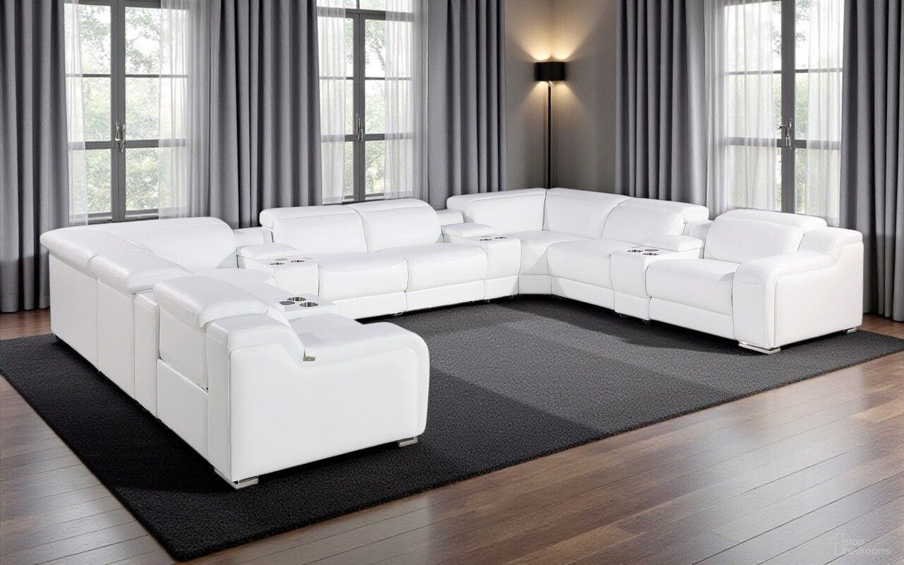 The appearance of Italian Leather Power Reclining U Shaped Twelve Piece Corner Sectional with Console In White designed by Homeroots in the modern / contemporary interior design. This white piece of furniture  was selected by 1StopBedrooms from  to add a touch of cosiness and style into your home. Sku: 632551. Material: Leather.