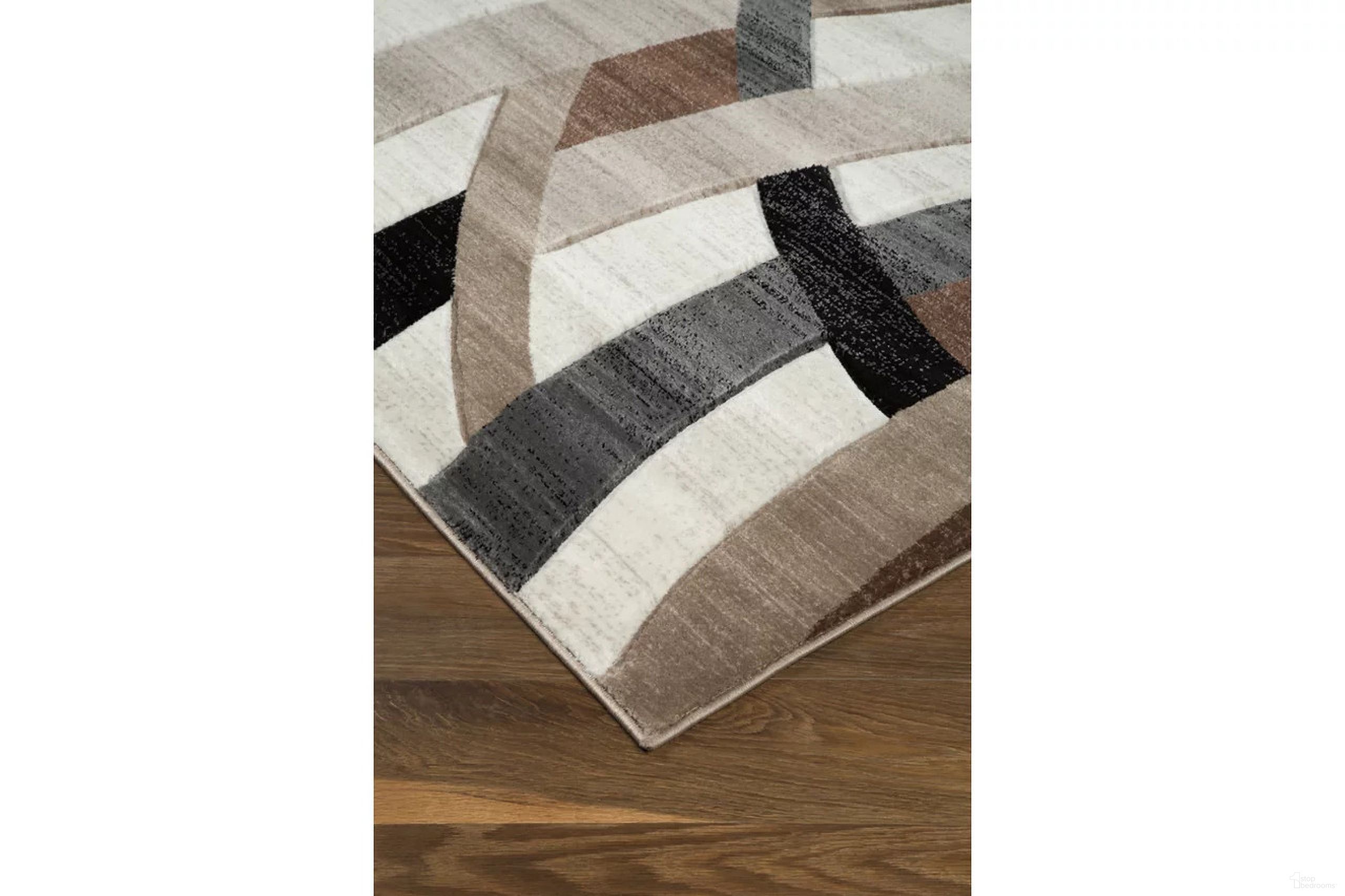 The appearance of Jacinth Brown Large Rug designed by Signature Design by Ashley in the modern / contemporary interior design. This multi piece of furniture  was selected by 1StopBedrooms from Jacinth Collection to add a touch of cosiness and style into your home. Sku: R402921. Material: Fabric.