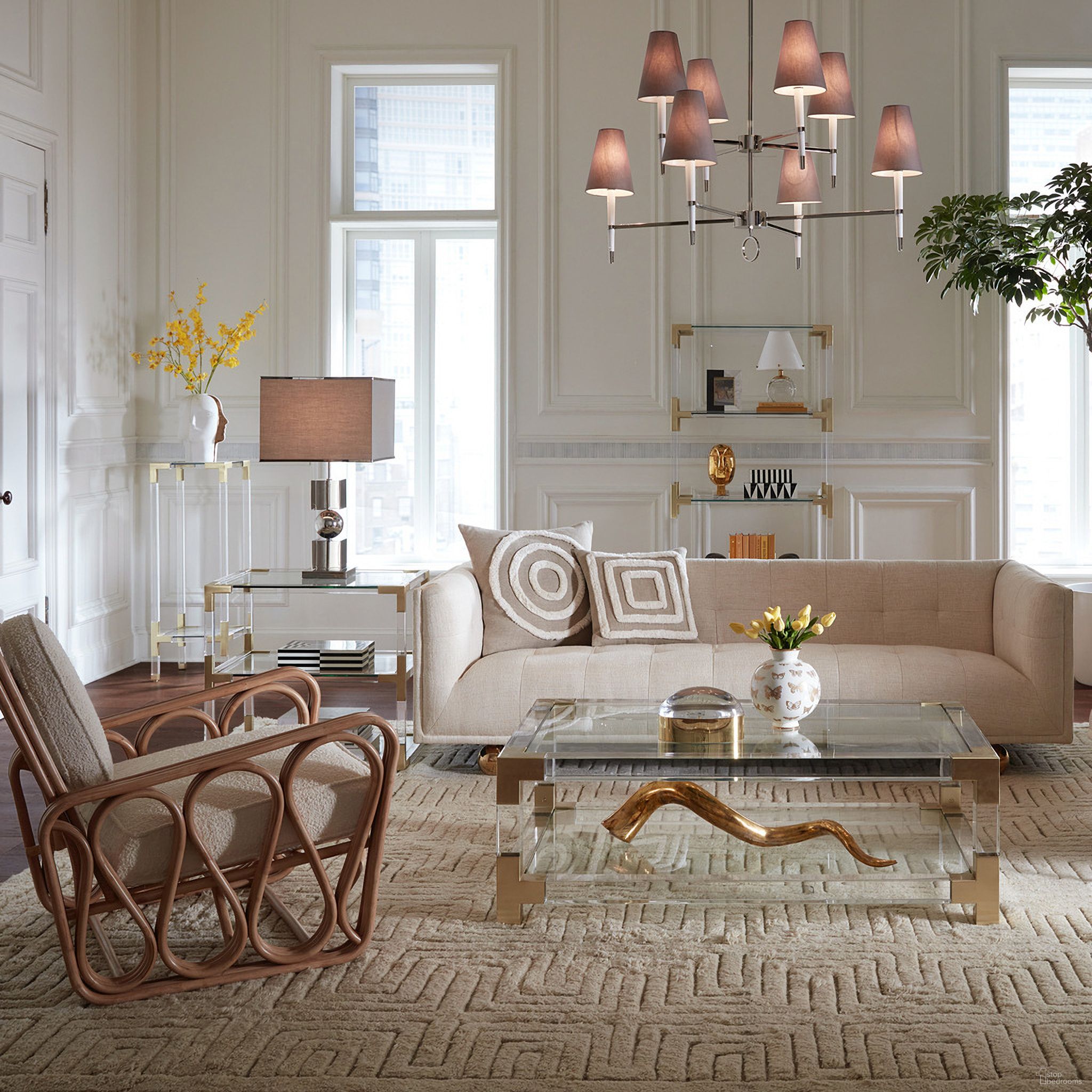 The appearance of Jacques Grand Occasional Table Set In Brass and Clear Acrylic designed by Jonathan Adler in the modern / contemporary interior design. This brass and clear acrylic piece of furniture  was selected by 1StopBedrooms from Jacques Collection to add a touch of cosiness and style into your home. Sku: 26317;17472. Material: Acrylic.