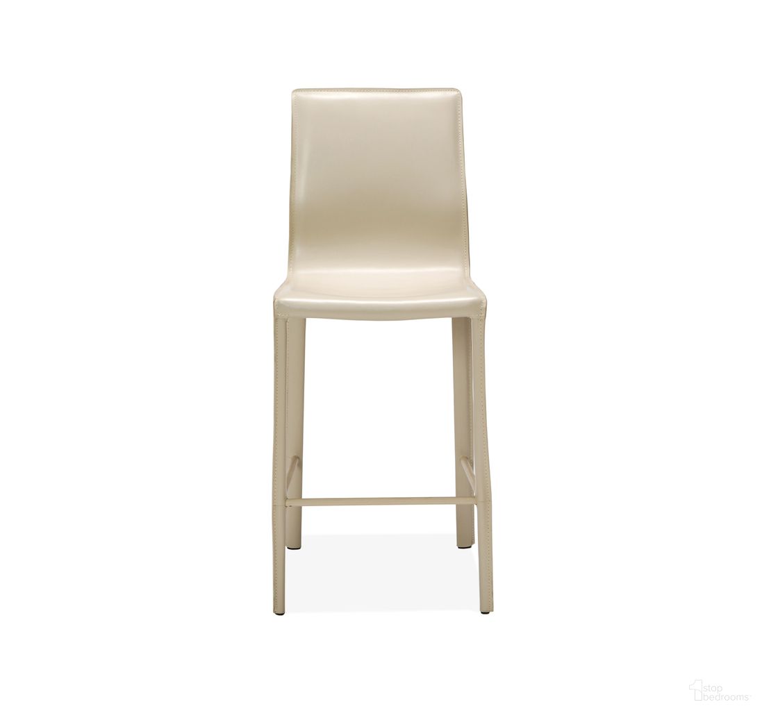 The appearance of Jada Counter Stool In Sand designed by Interlude Home in the modern / contemporary interior design. This sand piece of furniture was selected by 1StopBedrooms from Jada Collection to add a touch of cosiness and style into your home. Sku: 148097. Material: Leather.