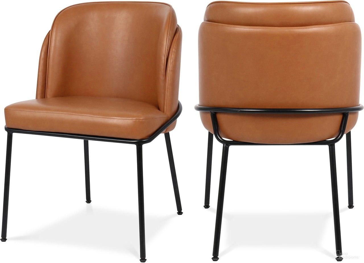The appearance of Jagger Vegan Leather Dining Chair Set of 2 In Cognac designed by Meridian in the modern / contemporary interior design. This cognac piece of furniture was selected by 1StopBedrooms from Jagger Collection to add a touch of cosiness and style into your home. Sku: 883Cognac-C. Material: Wood. Chair Type: Side Chair.