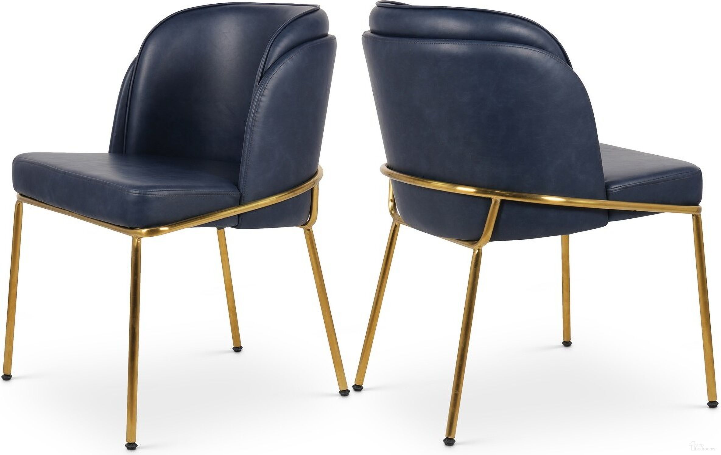 The appearance of Jagger Vegan Leather Dining Chair Set of 2 In Navy and Gold designed by Meridian in the modern / contemporary interior design. This navy piece of furniture was selected by 1StopBedrooms from Jagger Collection to add a touch of cosiness and style into your home. Sku: 882Navy-C. Material: Wood. Chair Type: Side Chair.