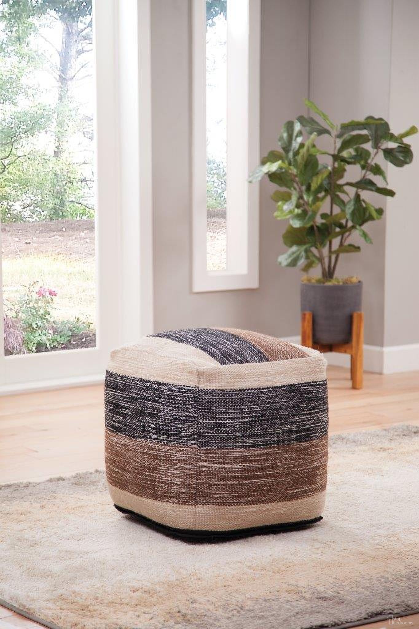 The appearance of Jamal Square Handwoven Woolen Ottoman In Brown designed by Steve Silver in the transitional interior design. This brown piece of furniture  was selected by 1StopBedrooms from Jamal Collection to add a touch of cosiness and style into your home. Sku: JM180P. Material: Fabric.