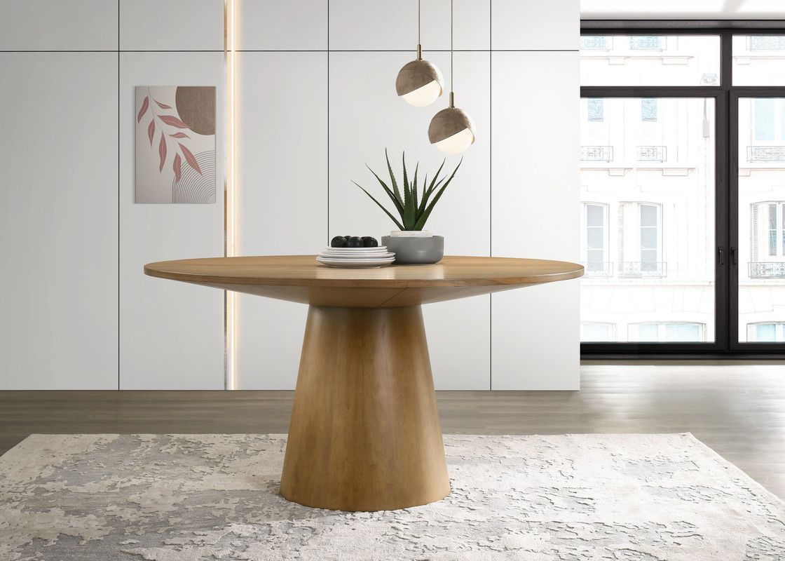 The appearance of Jasper 59 Inch Round Dining Table In Driftwood designed by Lilola Home in the modern / contemporary interior design. This driftwood piece of furniture  was selected by 1StopBedrooms from Jasper Collection to add a touch of cosiness and style into your home. Sku: 30018-TOP;30018-BASE. Table Base Style: Pedestal. Table Top Shape: Round. Size: 59". Material: Solid Wood.