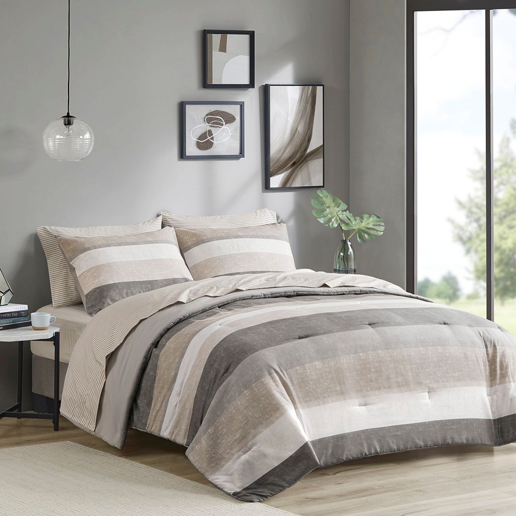 The appearance of Jaxon Stripe 7 Piece Full Comforter Set with Bed Sheets In Taupe and Grey designed by Olliix in the transitional interior design. This taupe and grey piece of furniture was selected by 1StopBedrooms from Jaxon Collection to add a touch of cosiness and style into your home. Sku: MPE10-1037. Material: Polyester. Bed Size: Full.