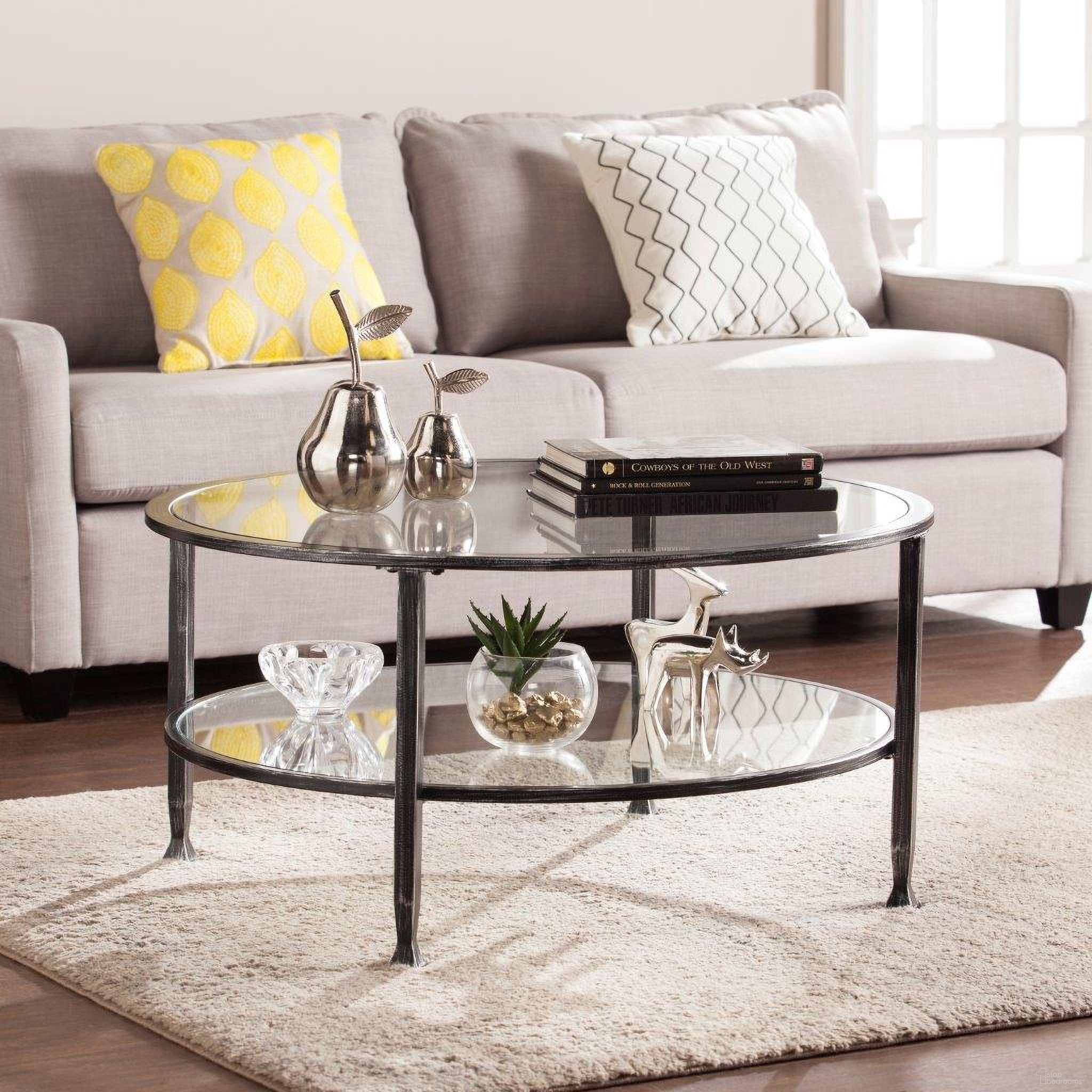 The appearance of Jaymes Metal-Glass Round Cocktail Table In Black designed by SEI Furniture in the modern / contemporary interior design. This black piece of furniture was selected by 1StopBedrooms from Jaymes Collection to add a touch of cosiness and style into your home. Sku: CK8740. Material: Glass.