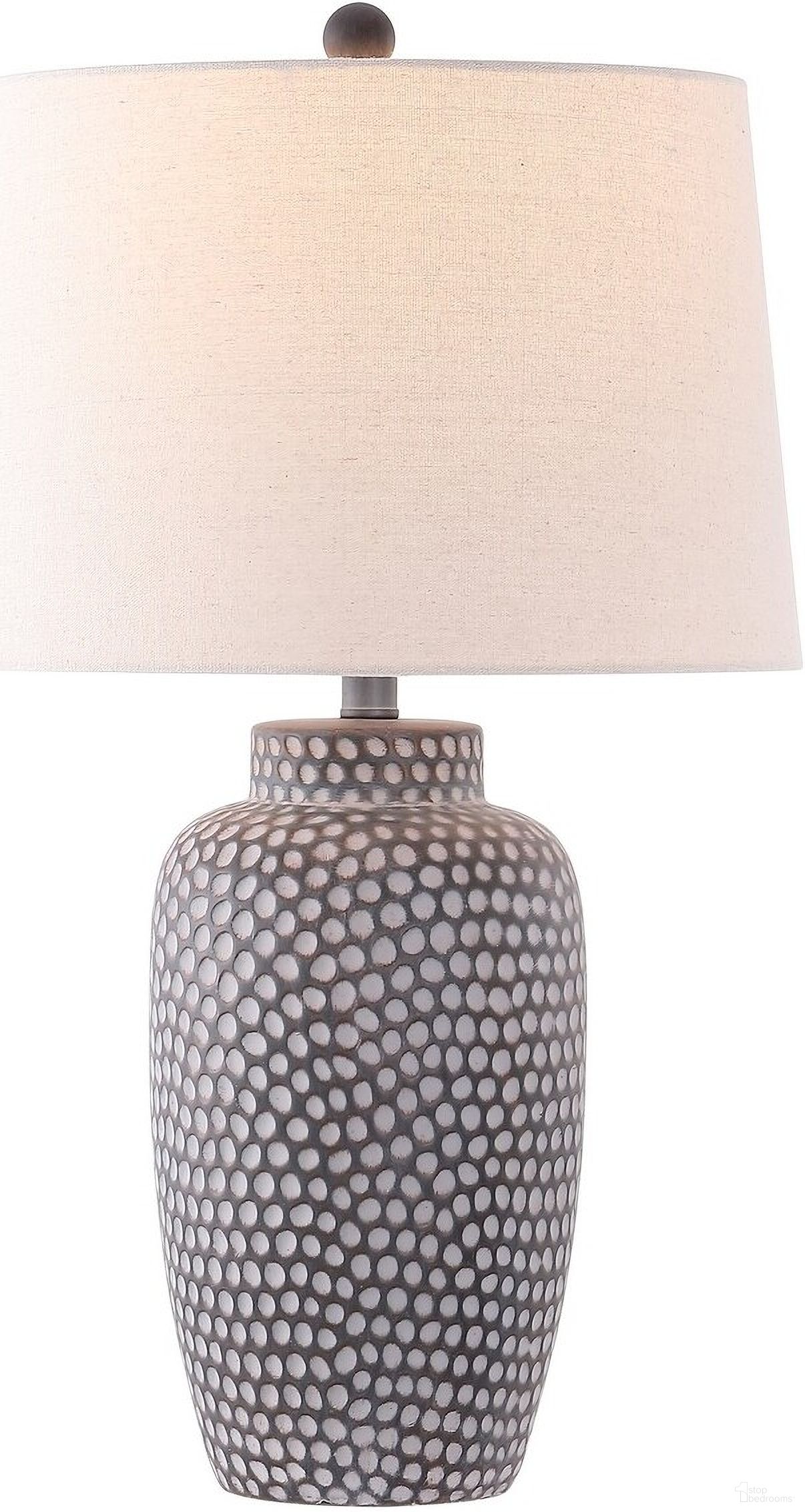 The appearance of Jerlen Table Lamp in White and Brown designed by Safavieh in the coastal interior design. This white and brown piece of furniture was selected by 1StopBedrooms from Jerlen Collection to add a touch of cosiness and style into your home. Sku: TBL4422A. Material: Cotton.